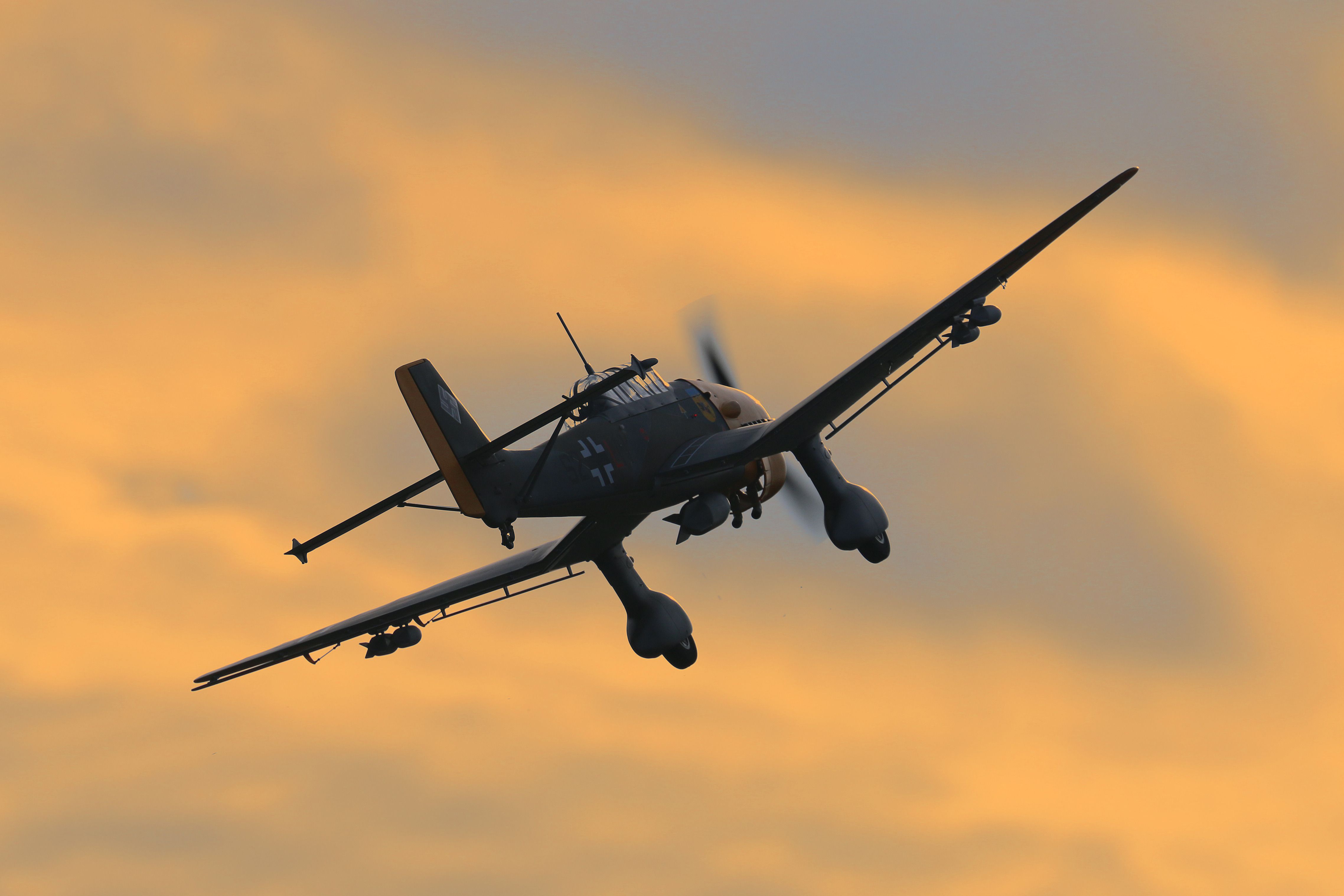 A Junkers Ju-87 Stuka flying in the sky.