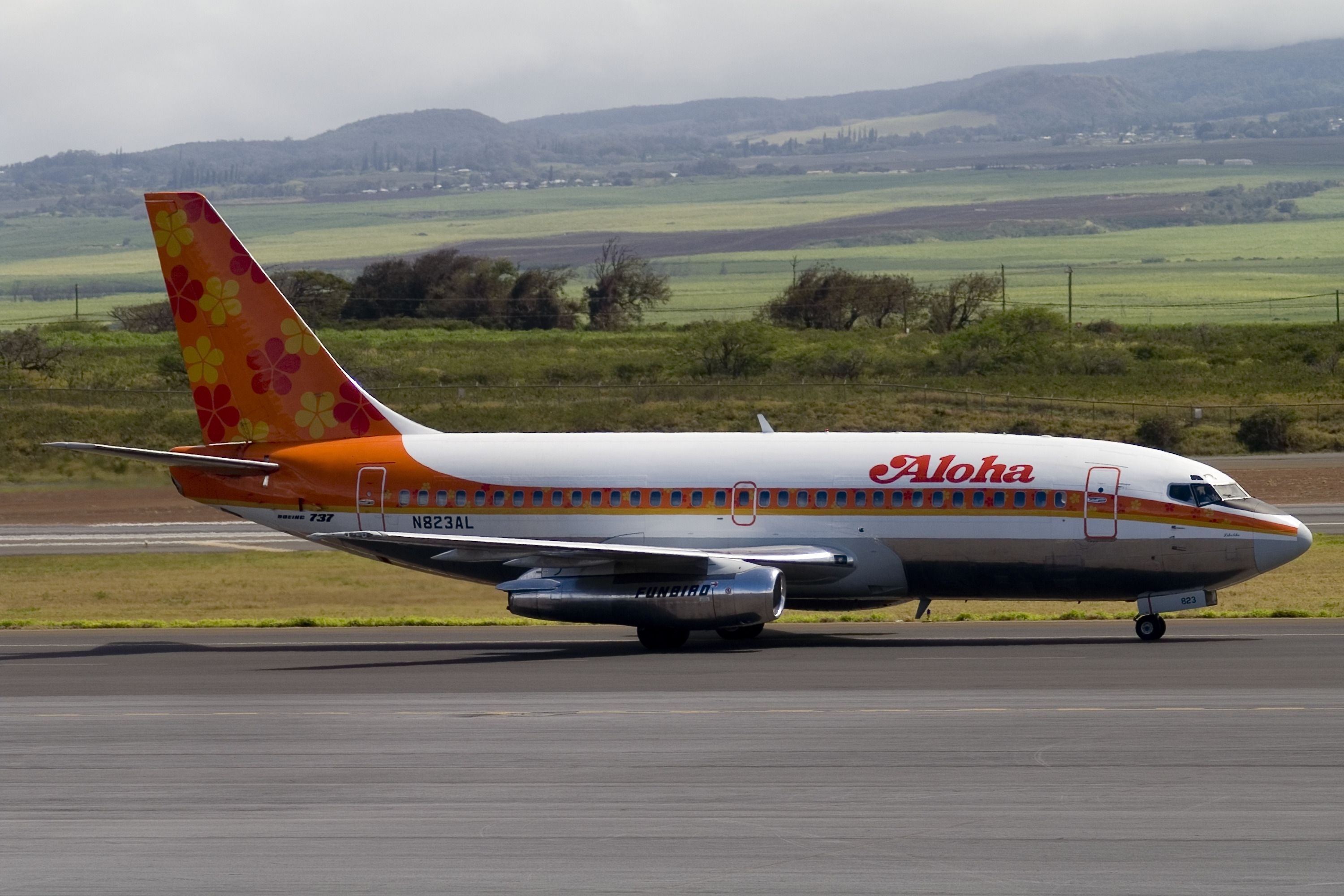An Aloha Airlines aircraft on a taxiway.