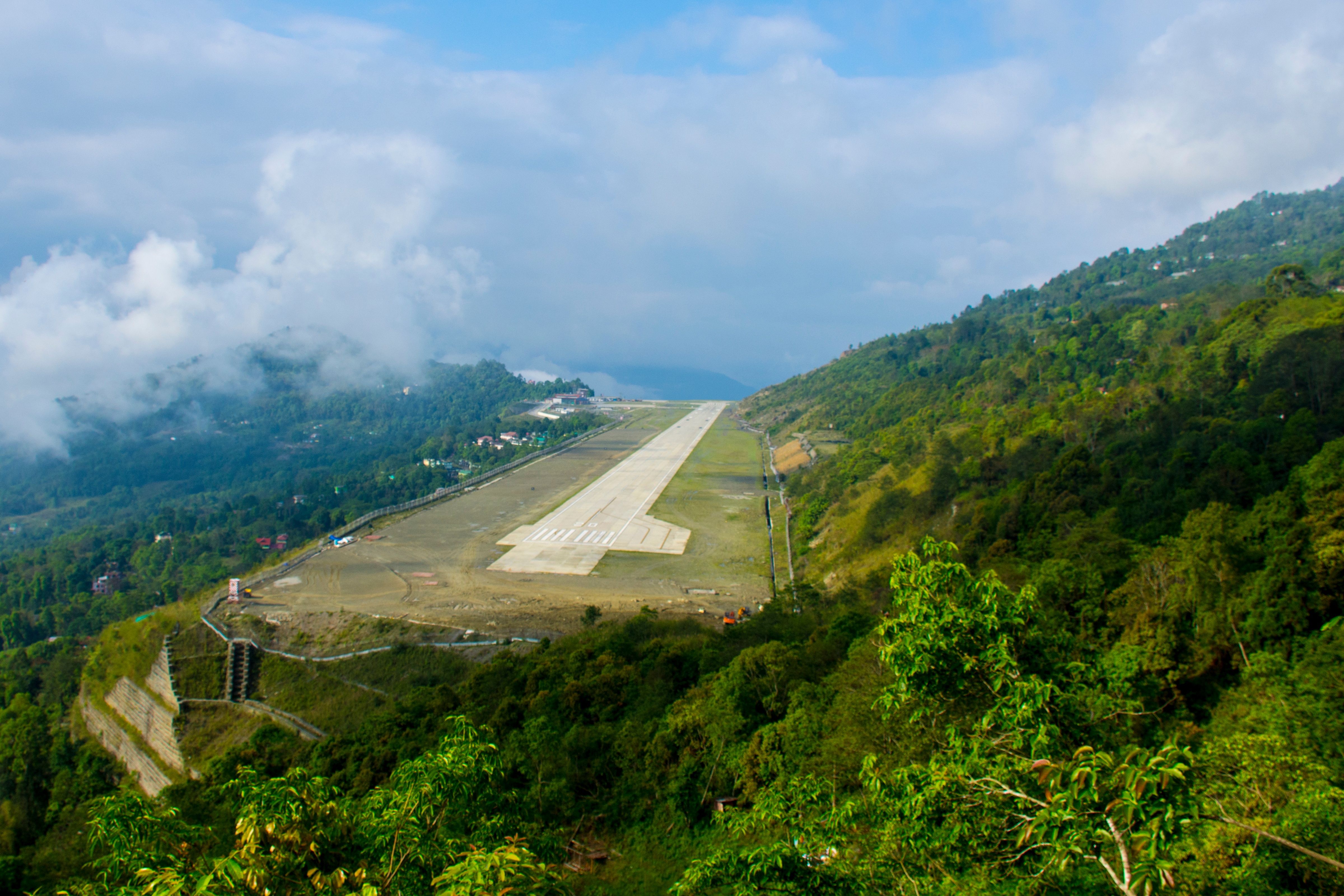 A runway on top of a mountain in India.