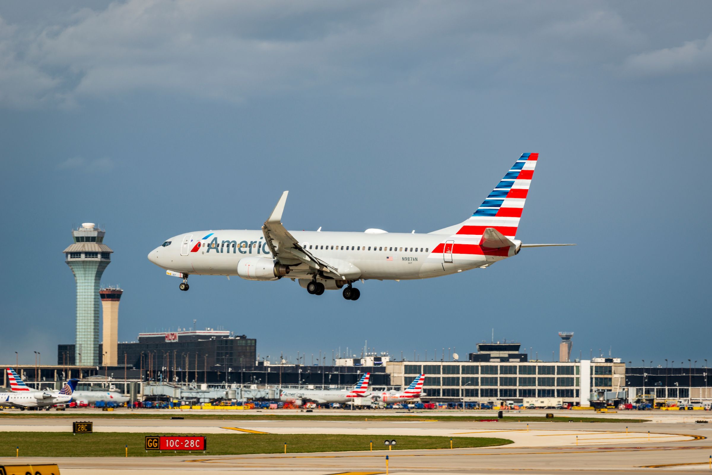 An American Airlines plane lands at Chicago O'Hare International Airport (ORD)