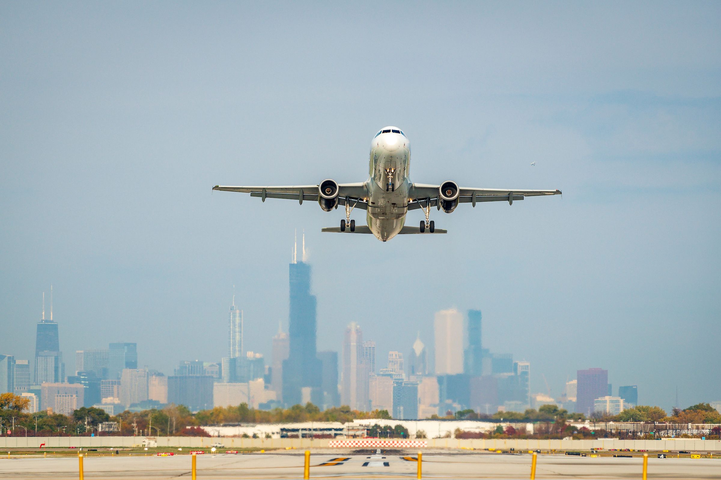 A takeoff with the Chicago skyline in the background.