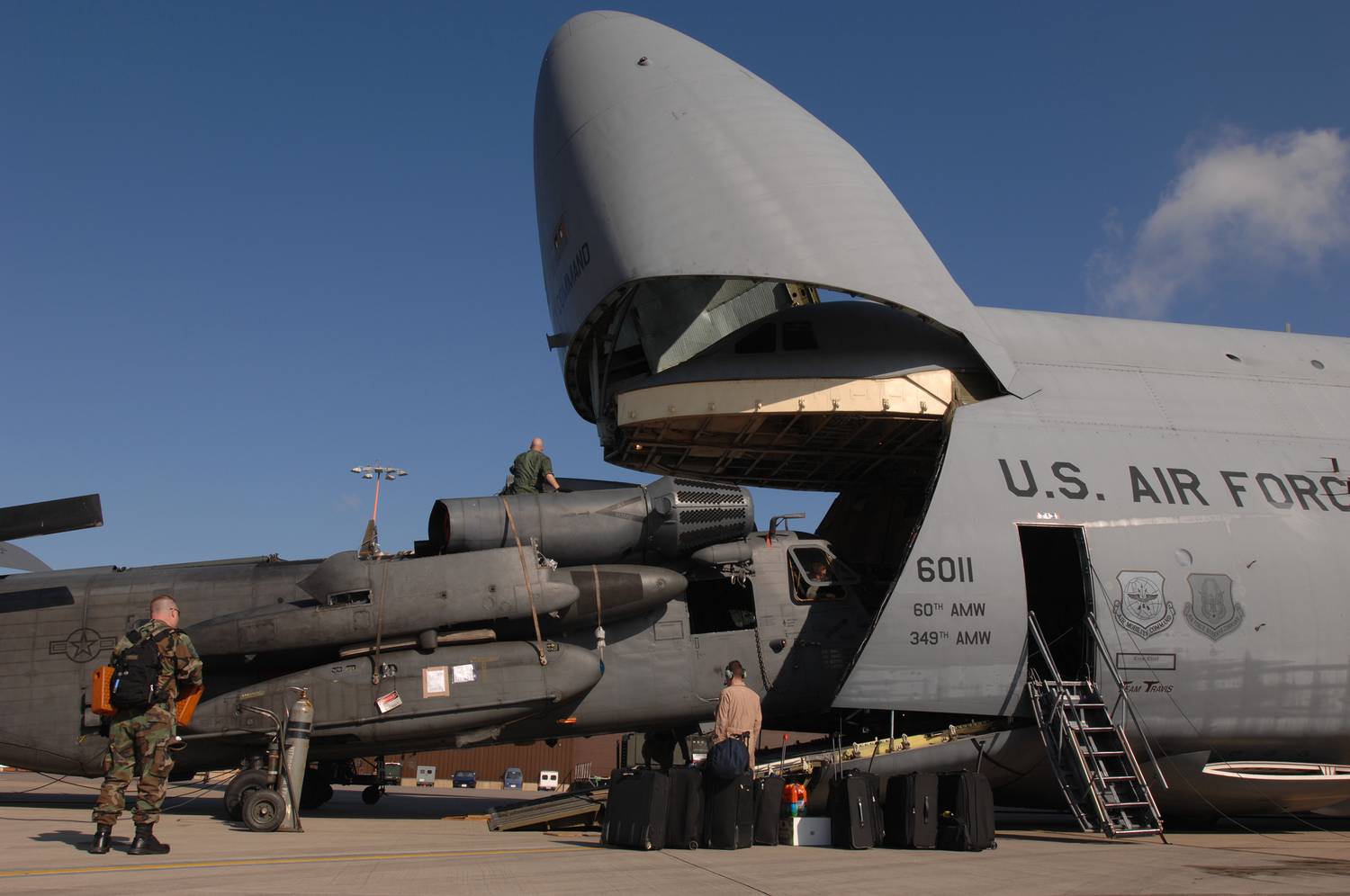 a-helicopter-being-loaded-into-a-c-5-gal