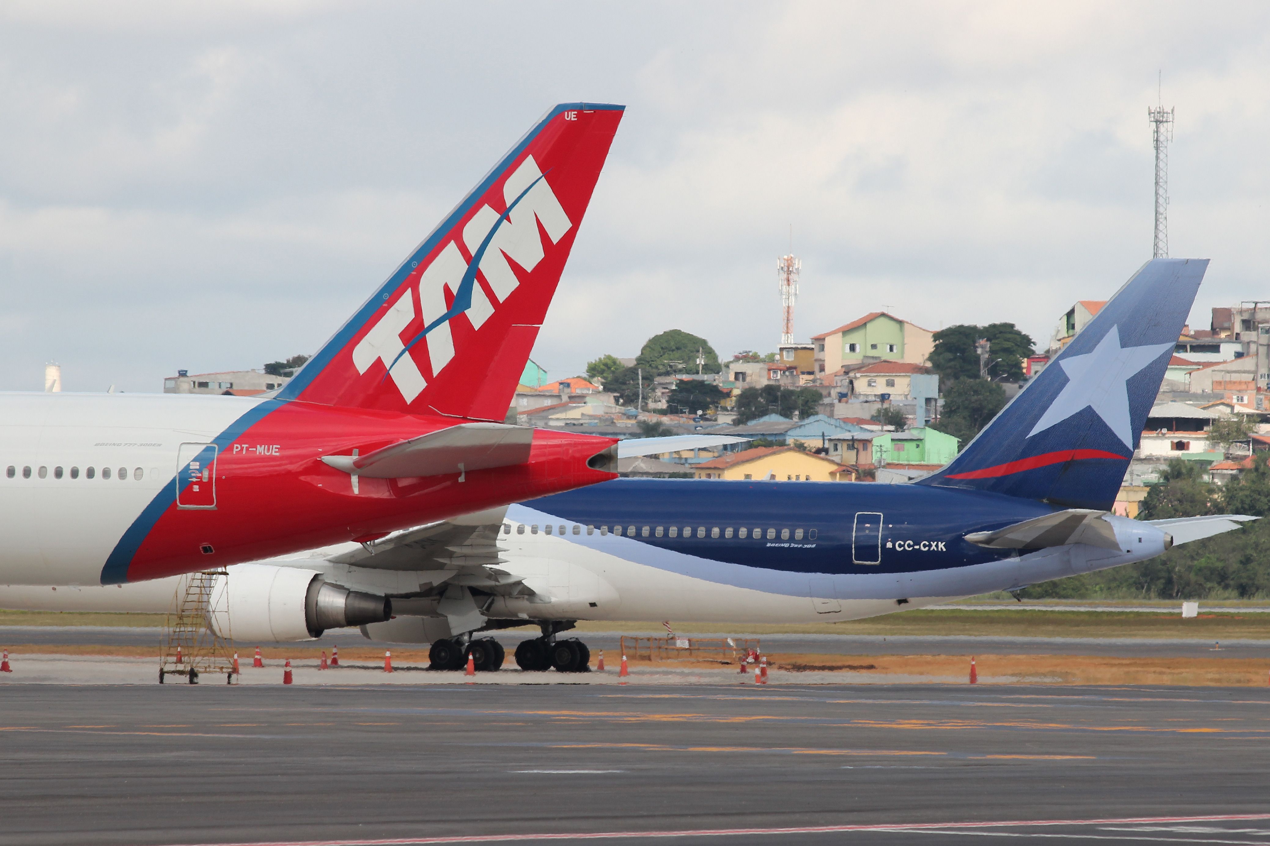 Aircraft from LAN and TAM parked side by side in Sao Paulo.