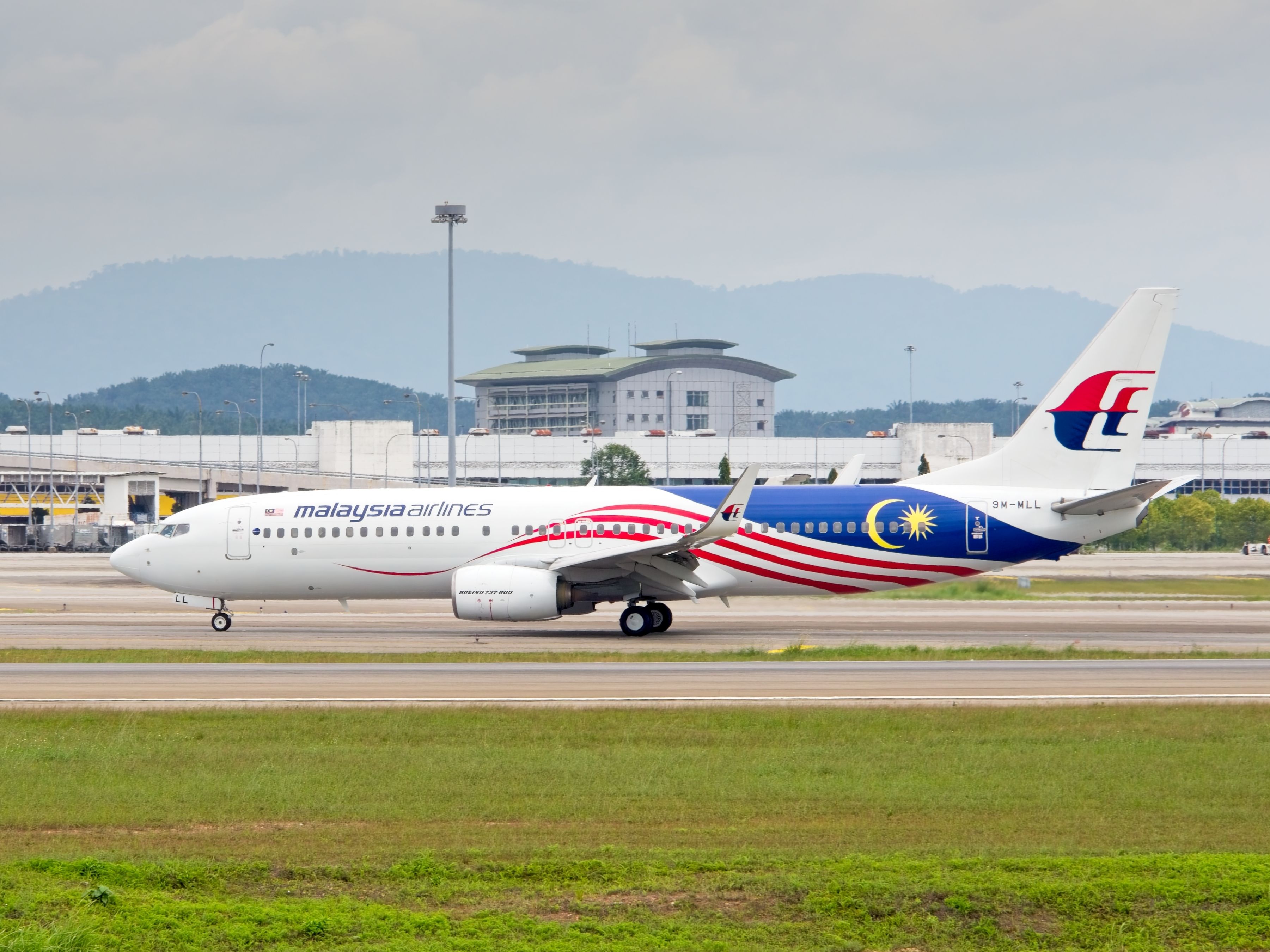 A Malaysia Airlines Boeing 737-800 on a taixway.