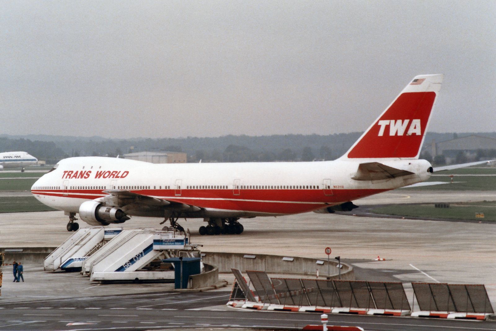 A Trans World Airlines TWA Boeing 747-100 on an airport apron.