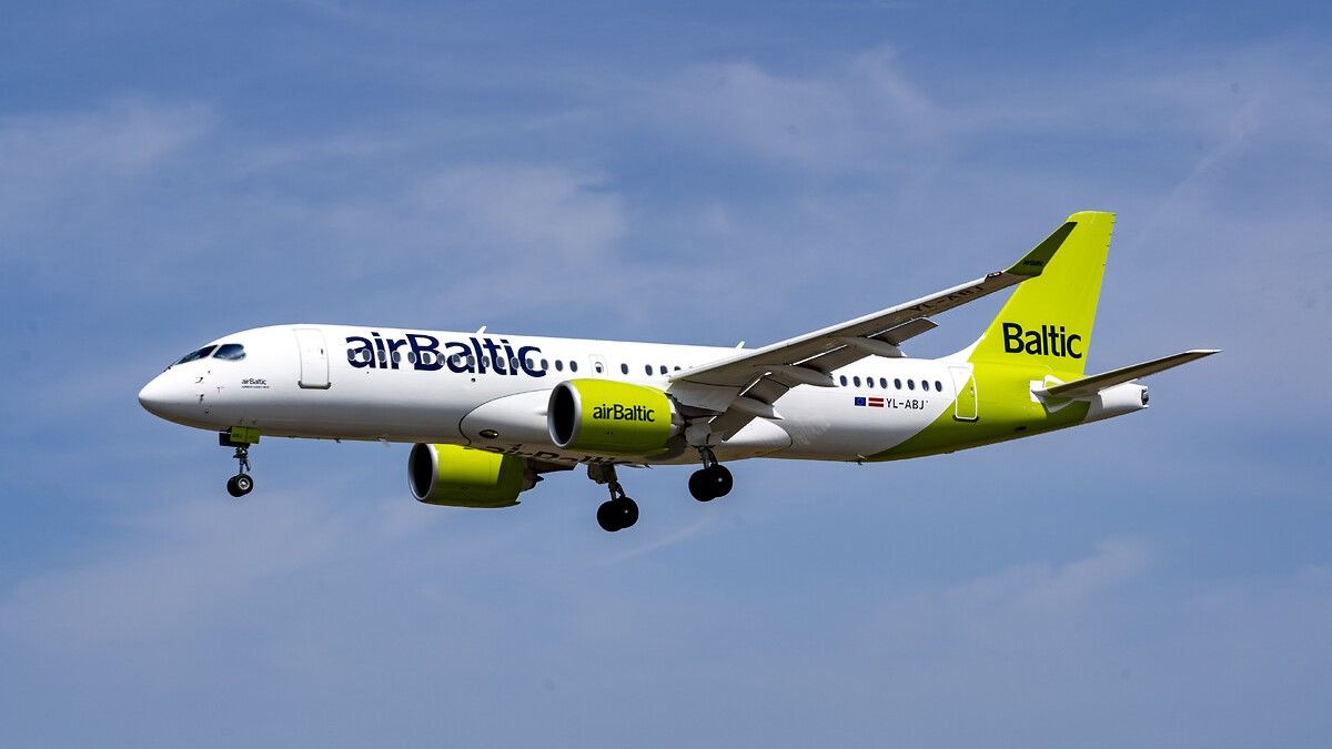 airBaltic Airbus A220 Landing In Sunny Conditions