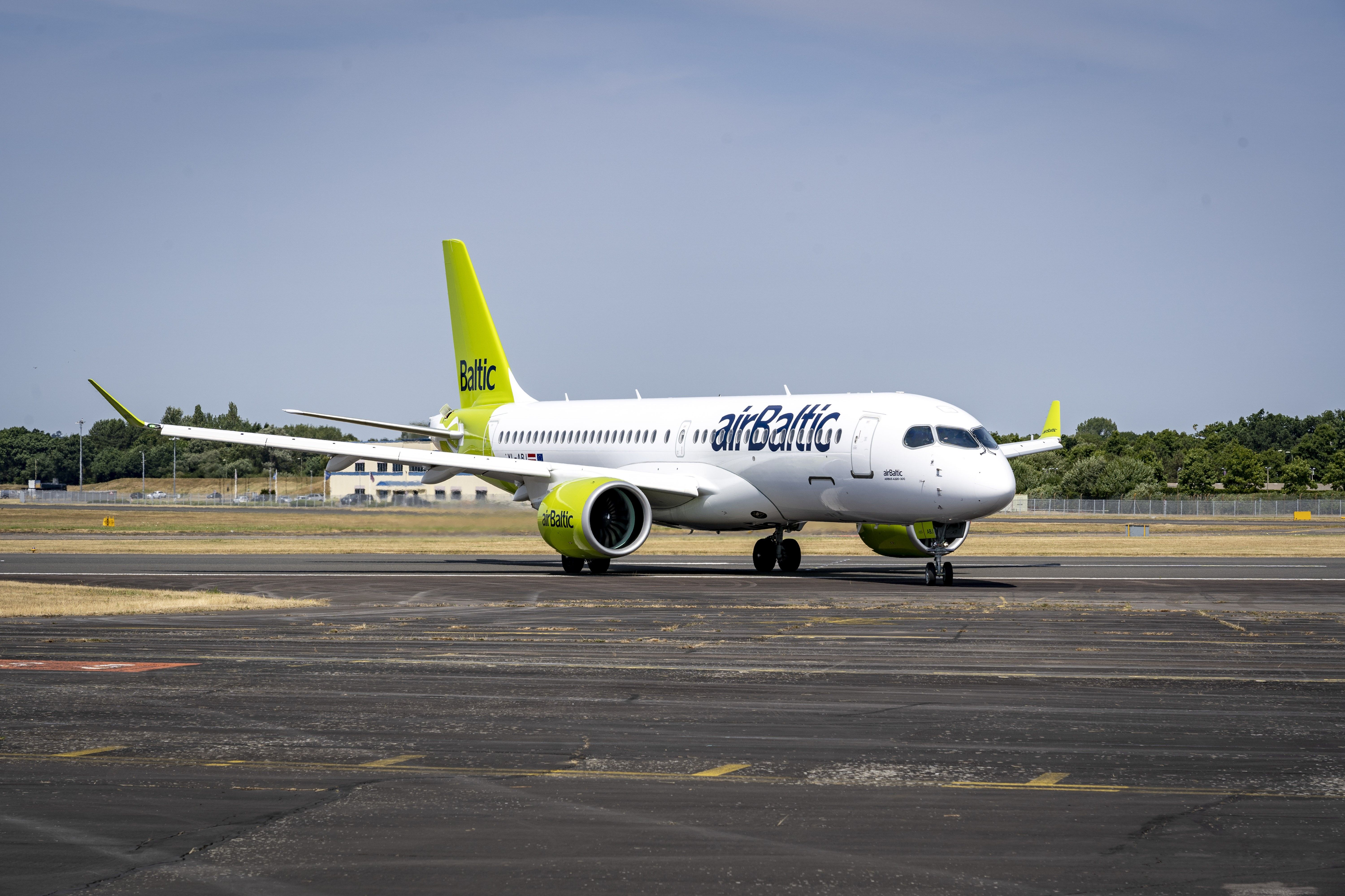 airBaltic Airbus A220 Taxiing In Sunny Conditions