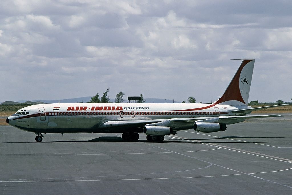 An Air India Boeing 707 parked on an airport apron.