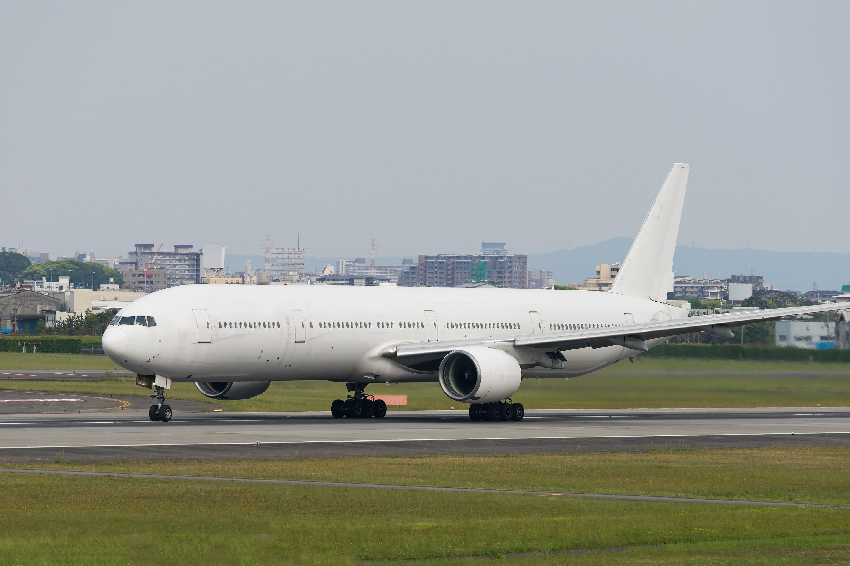All-white Boeing 777 taxiing