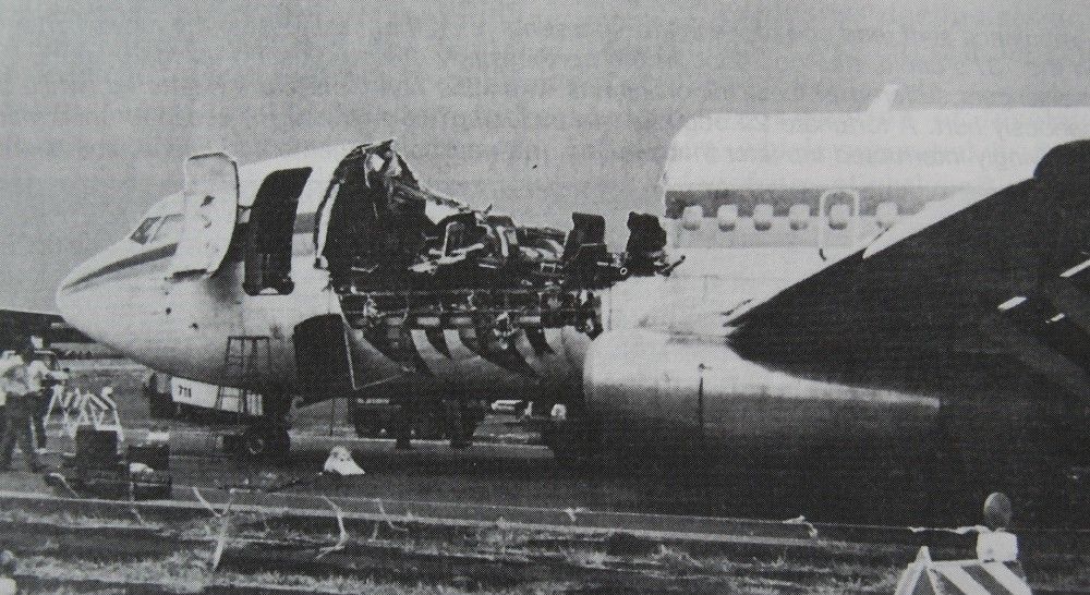 A black and white photo of the damaged aircraft involved with Aloha Airlines Flight 243.