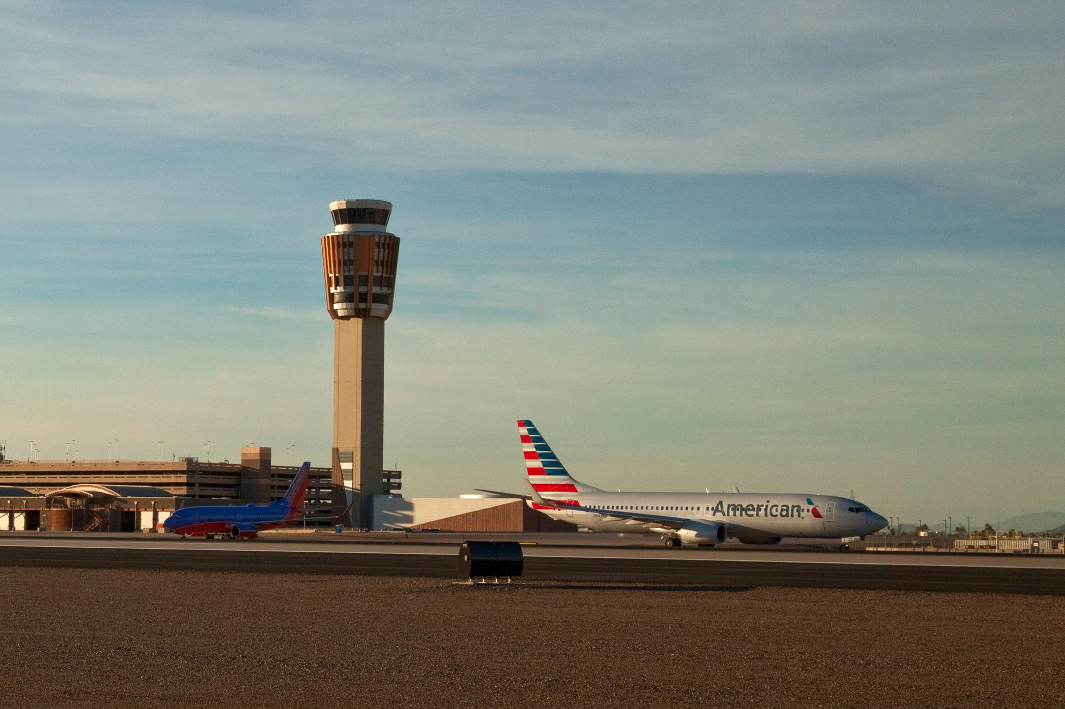 American Airlines and Southwest Airlines aircraft on the apron at Phoenix Sky Harbor International Airport.