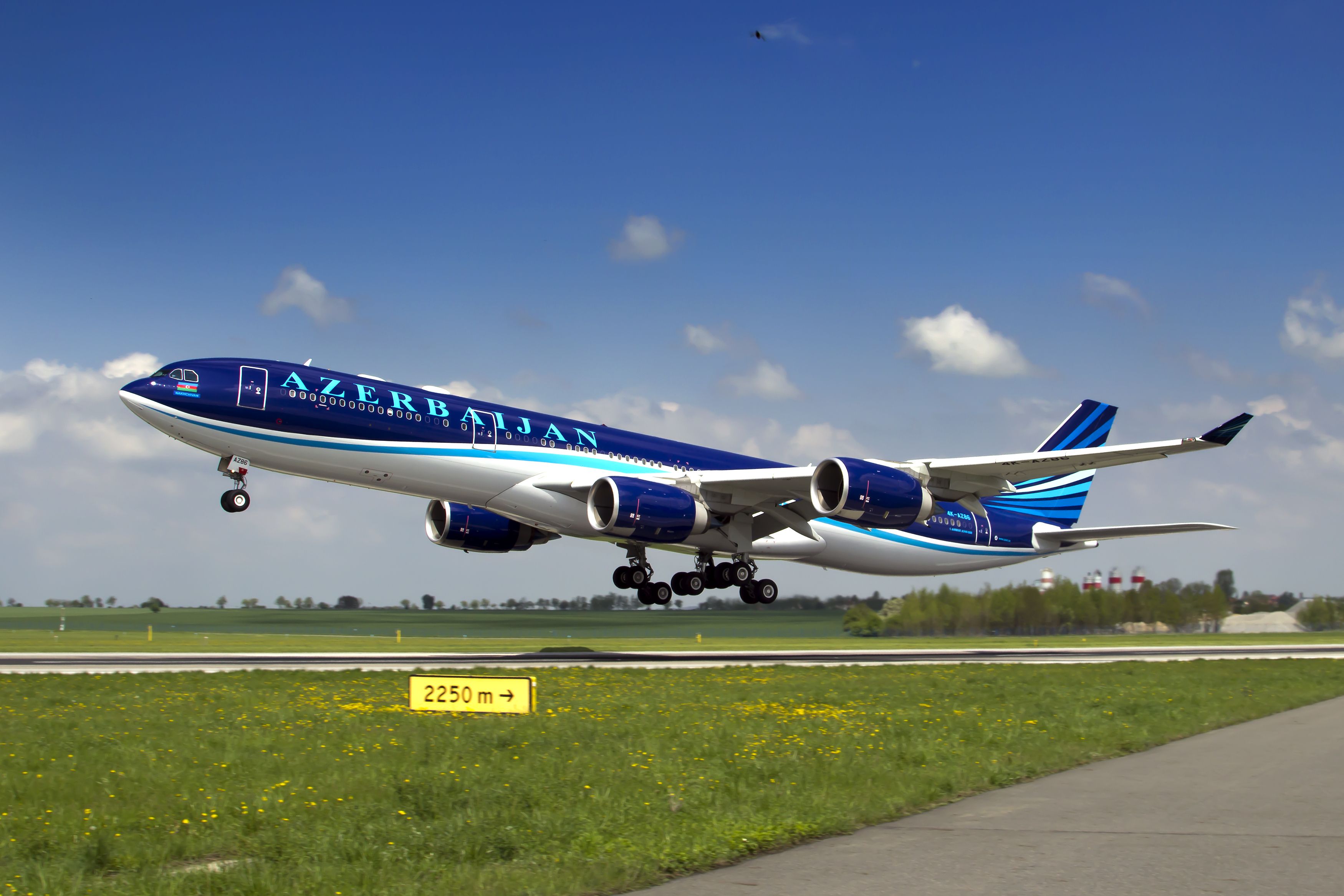 An AZAL Azerbaijan Airlines Airbus A340 taking off.