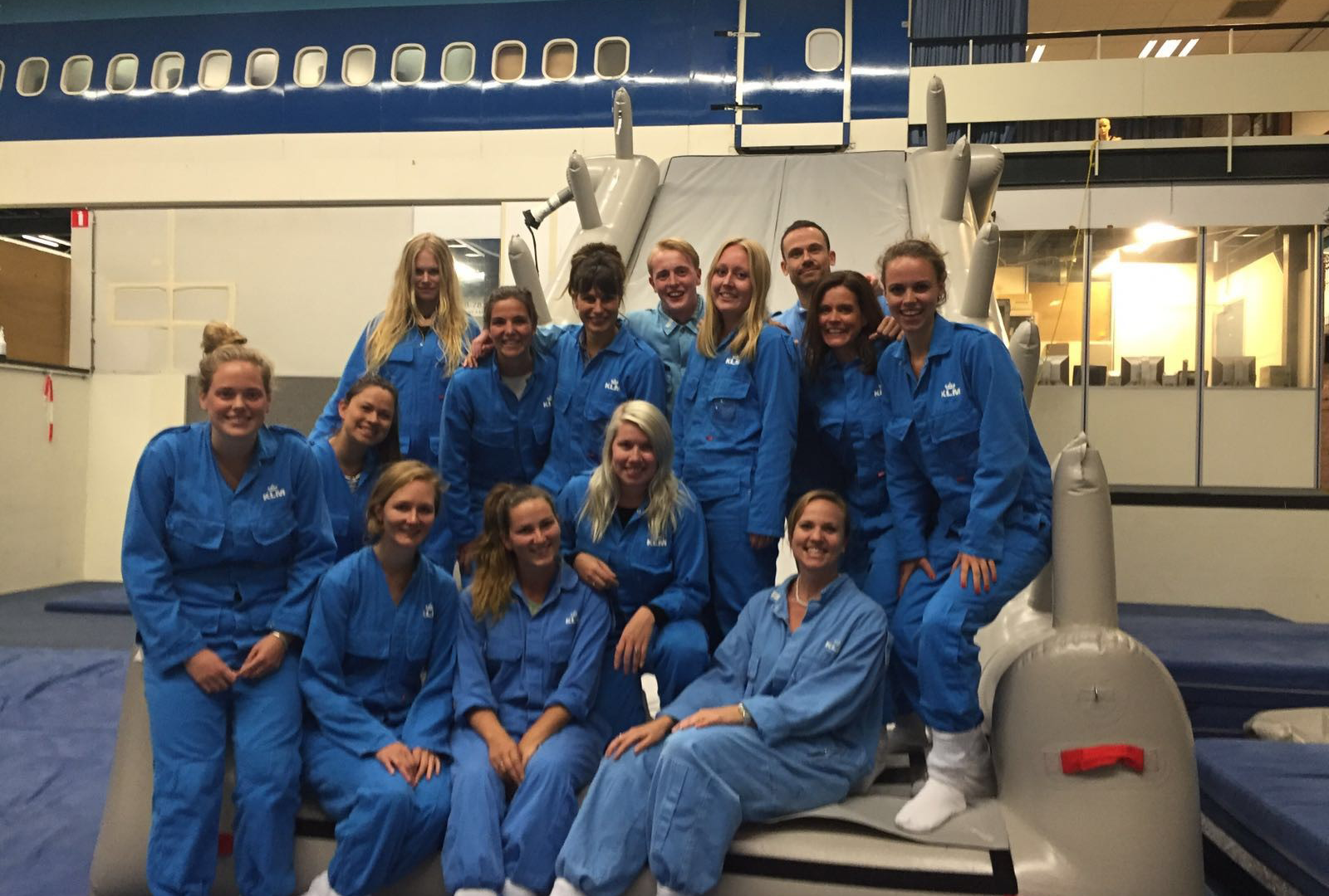 KLM cabin crew preparing for slide and evacuation training