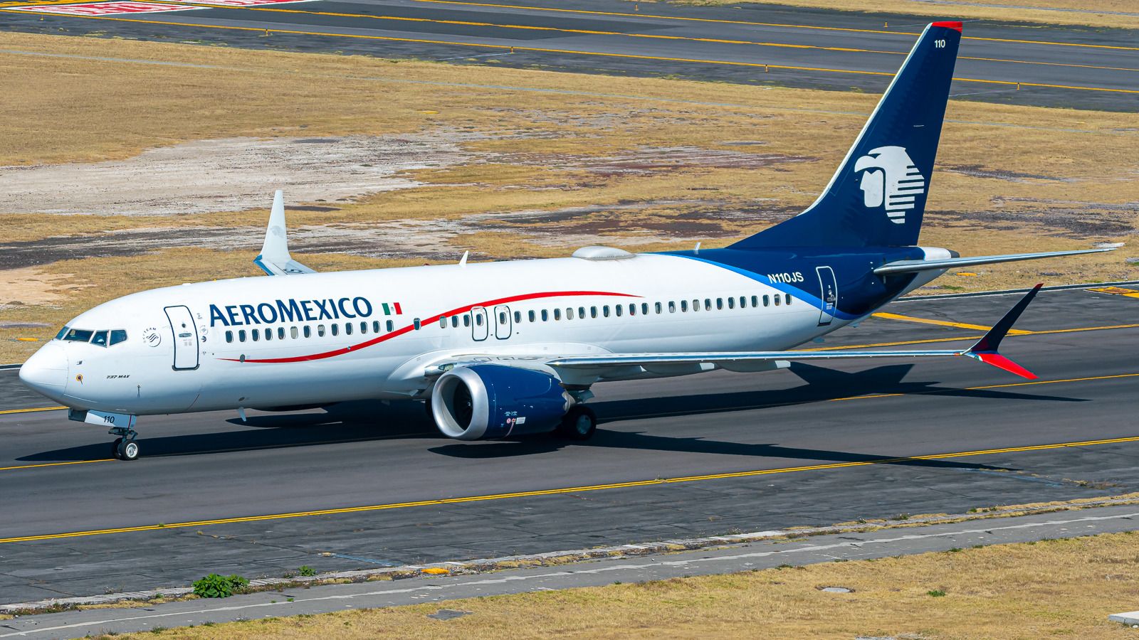 An Aeromexico Boeing 737 MAX 8 aircraft on a runway.