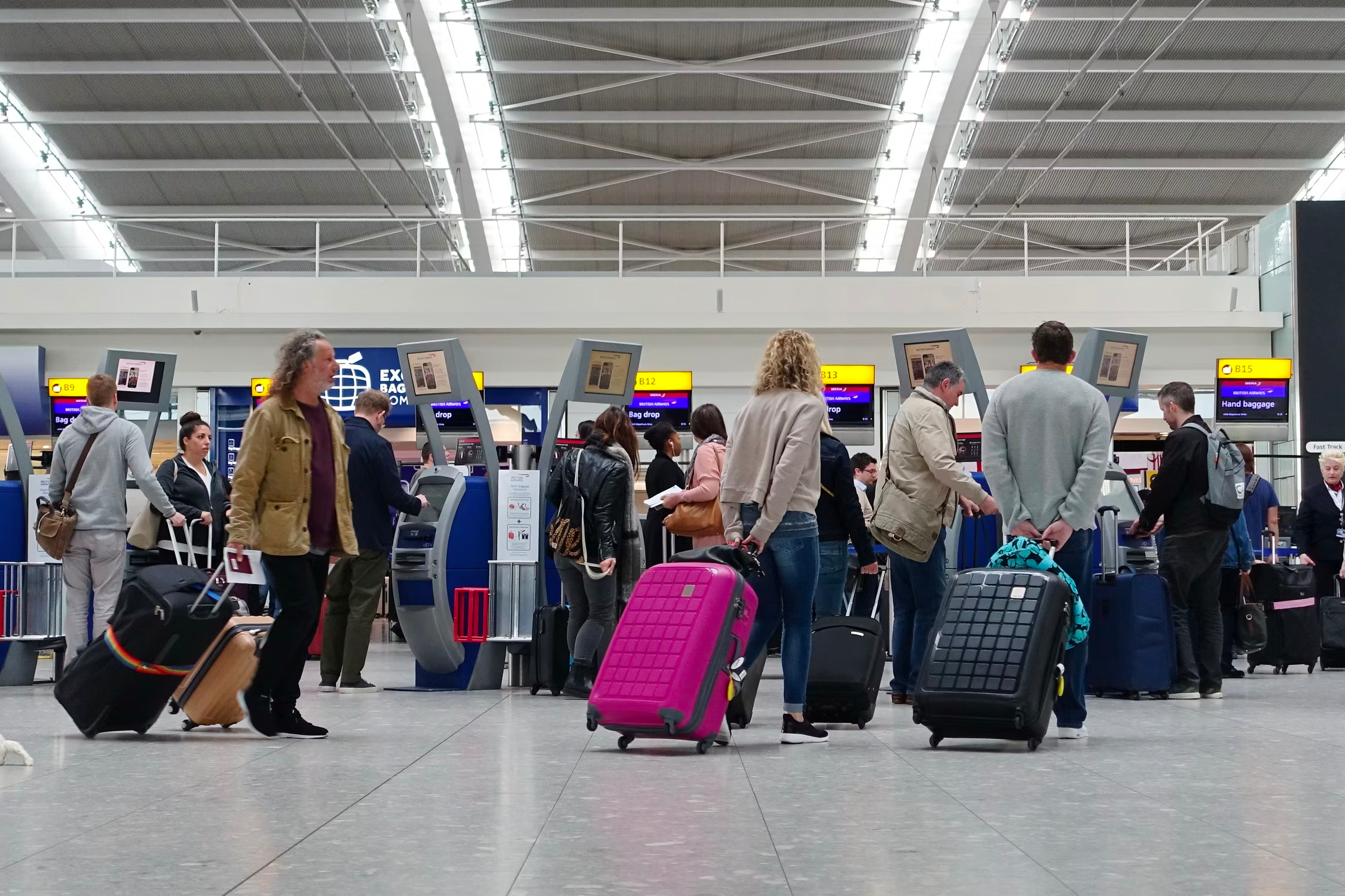 passengers queuing up in an airport