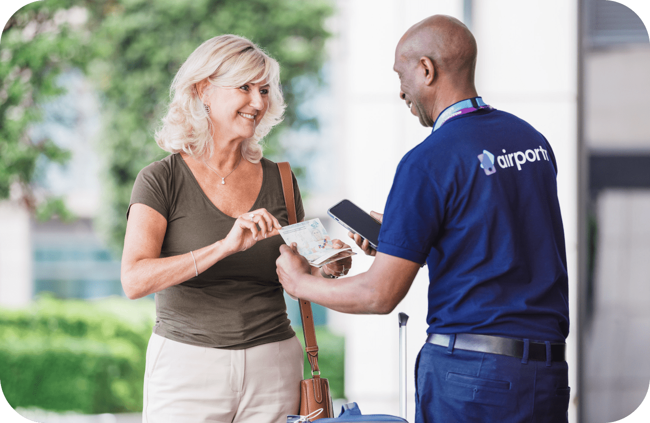 AirPortr employee scanning passengers identification before taking their luggage 