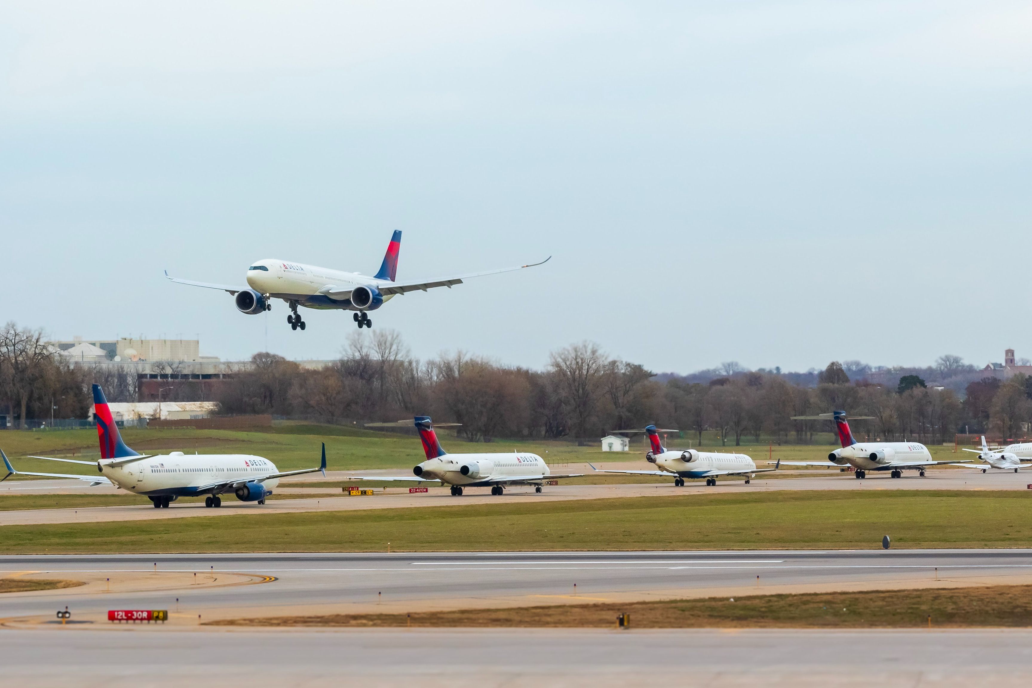 Delta Air Lines Planes lined up at Minneapolis–Saint Paul International Airport.