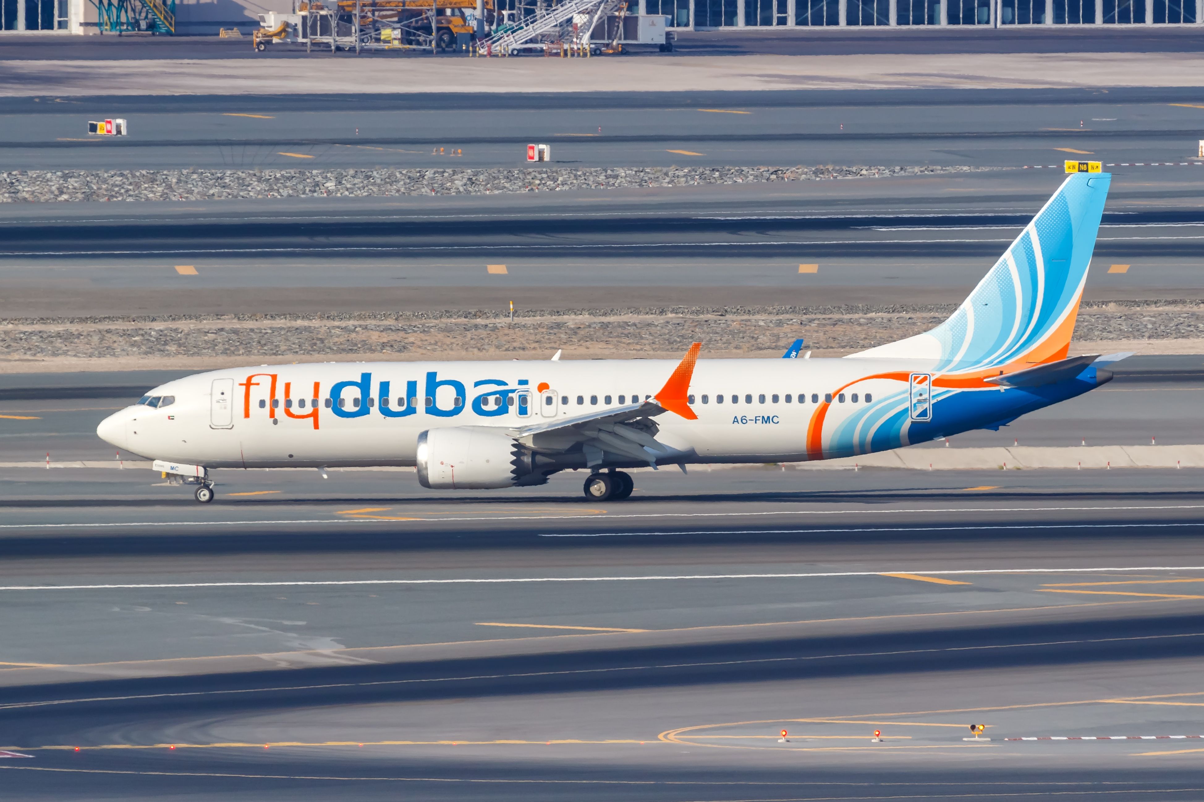 flydubai Boeing 737 MAX on the runway at Dubai International Airport DXB