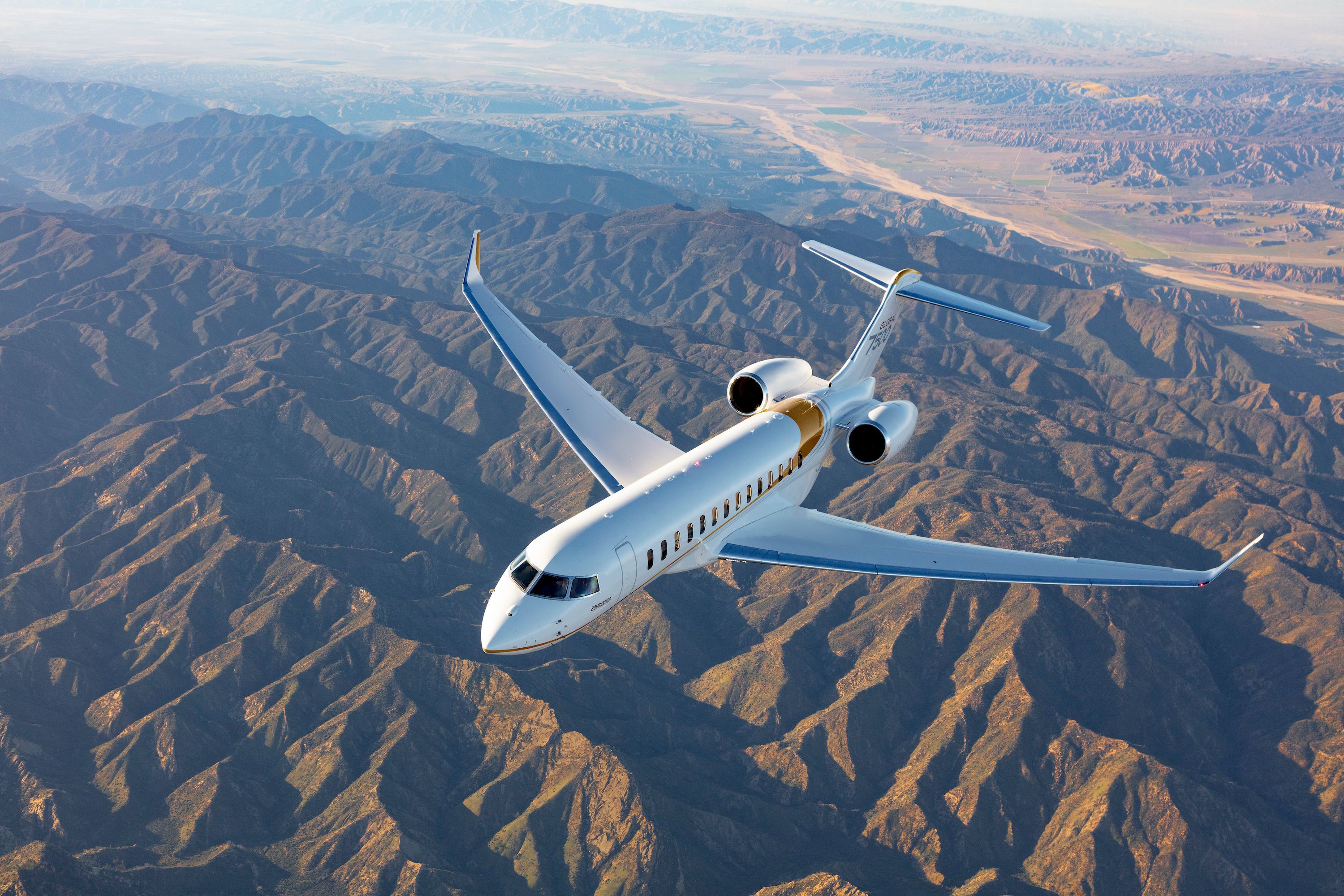 A Bombardier Global 7500 flying in the sky.