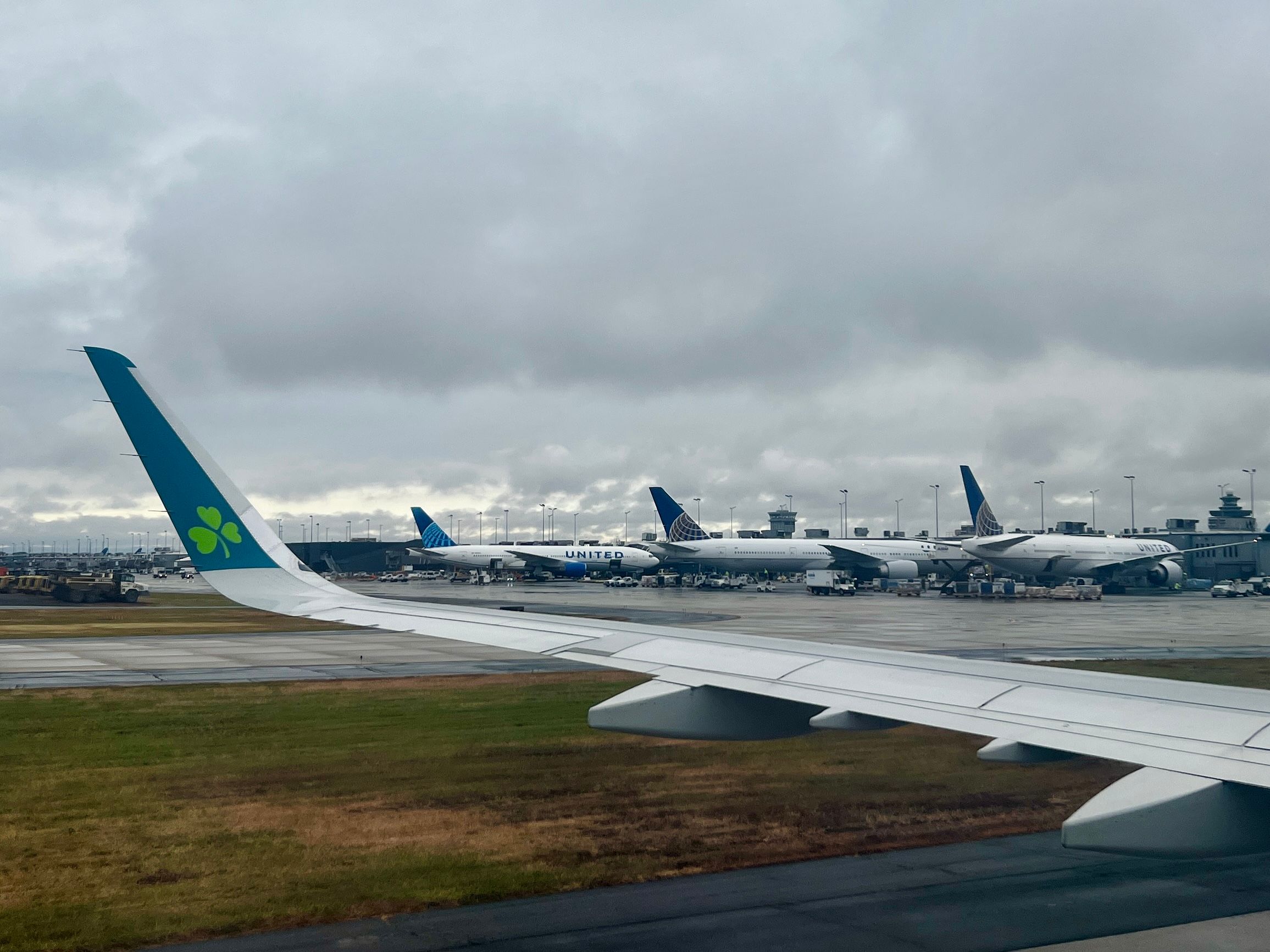 Several United Airlines aircraft parked at Washington Dulles Airport.