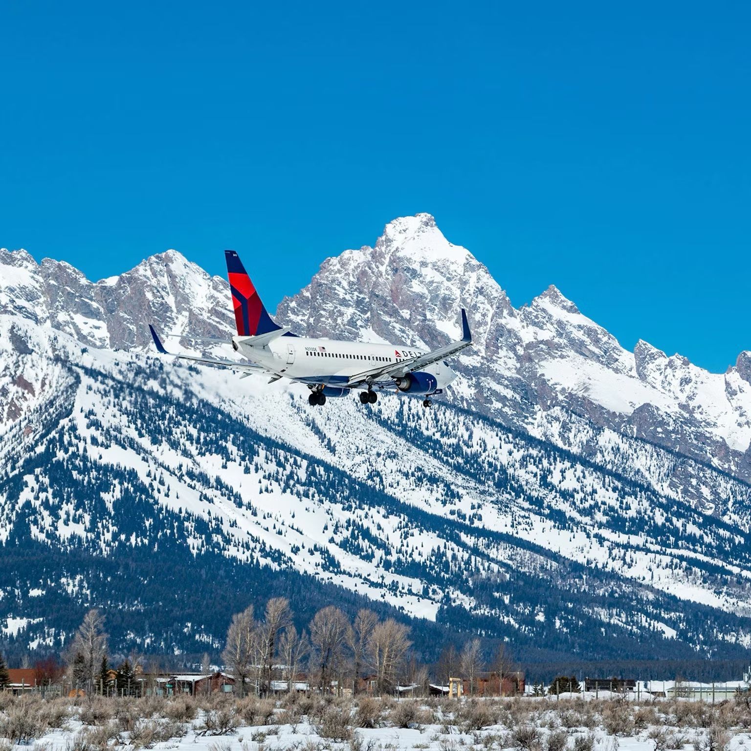 A Delta Air Lines aircraft about to land at Jackson Hole International Airport.