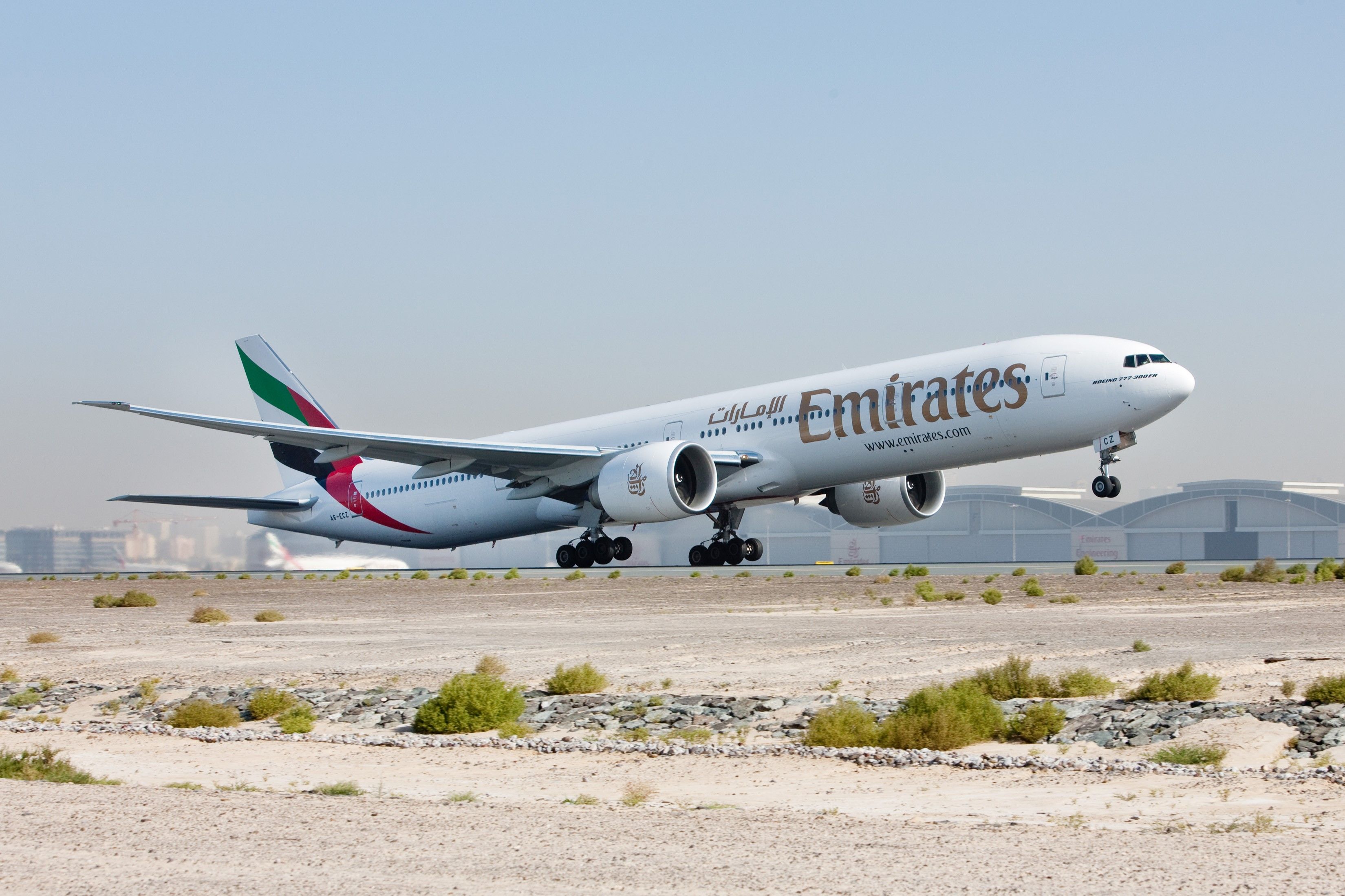 Emirates Boeing 777-300ER Taking Off In Sunny Conditions