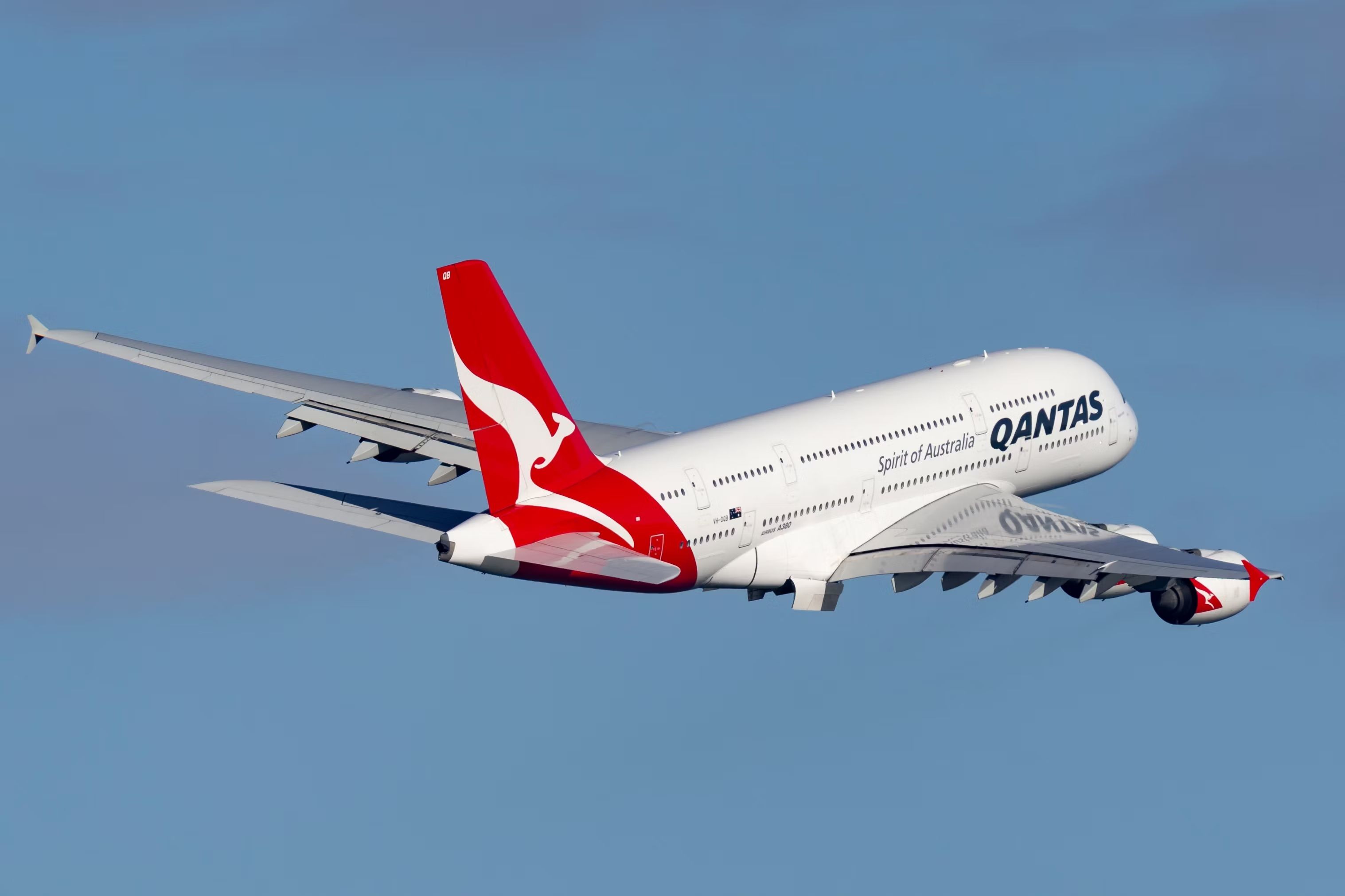A Qantas Airbus A380 flying in the sky.