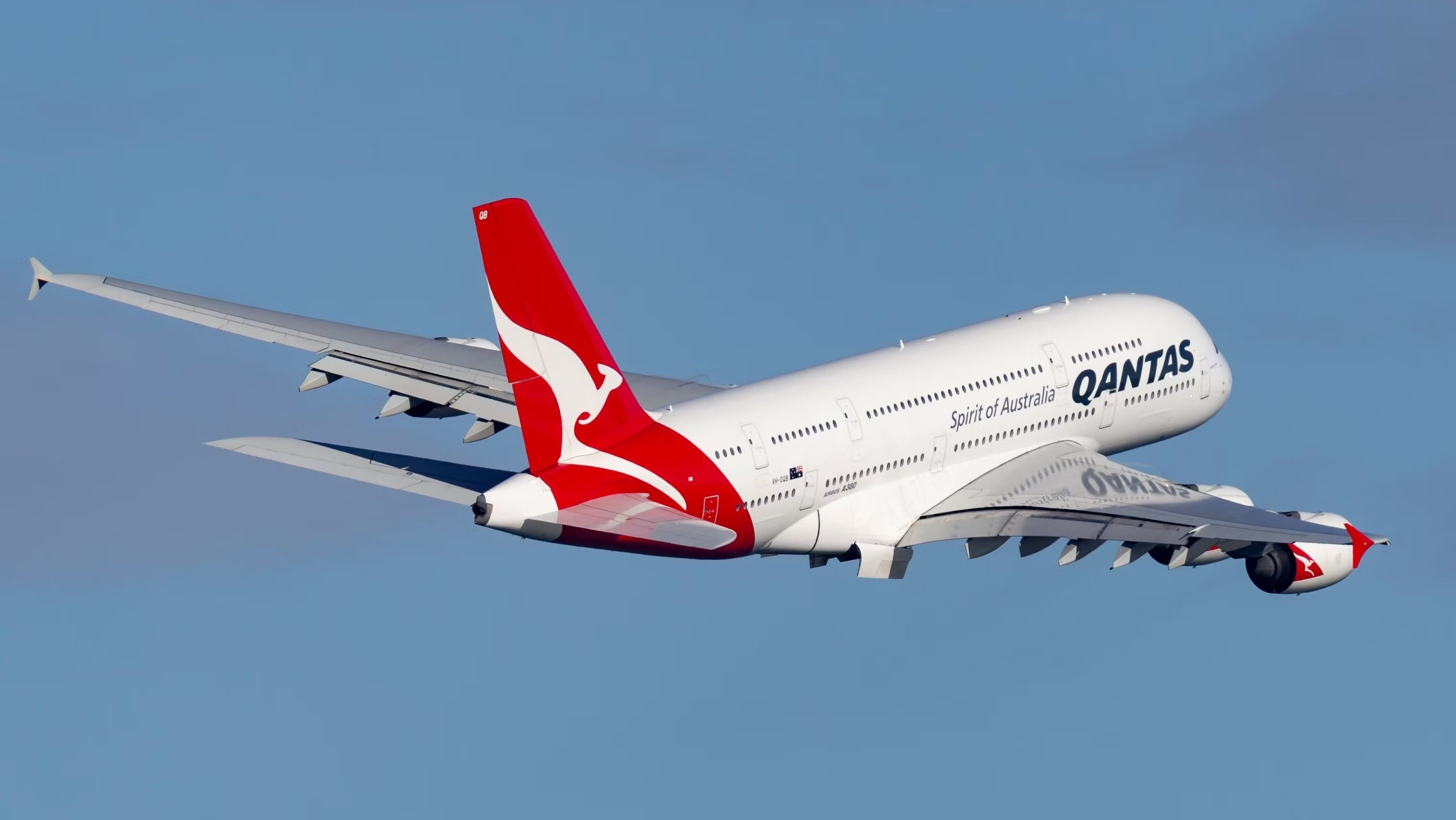 A Qantas A380 flying in the sky.