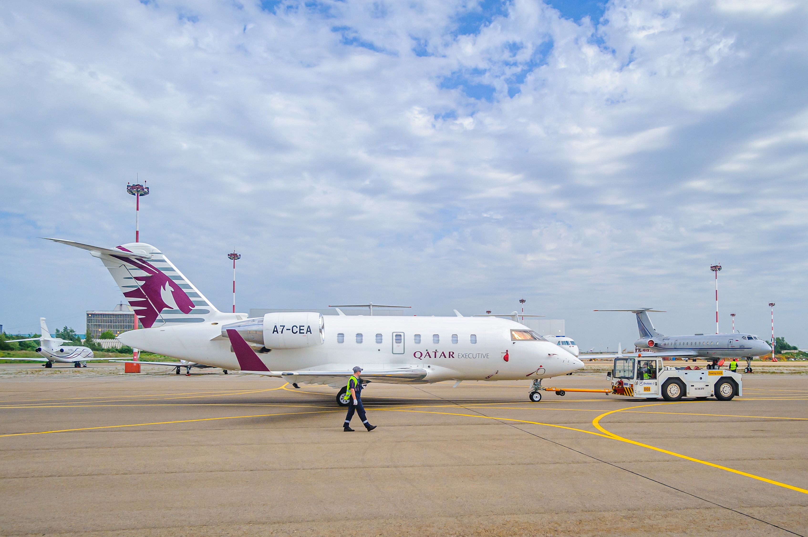 A Qatar Executive Bombardier Challenger 600 on an airport apron.