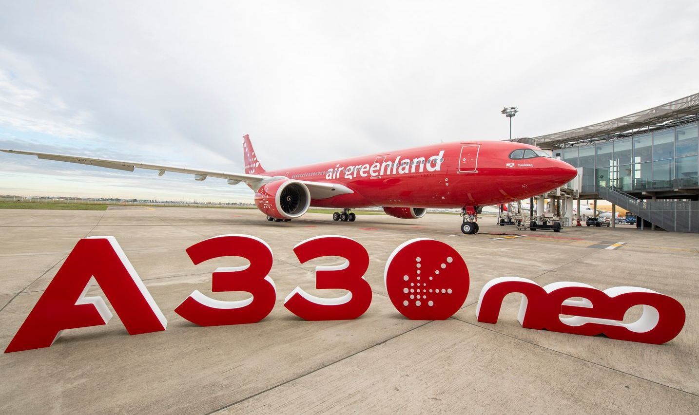 Air Greenland A330-800 parked behind the sign