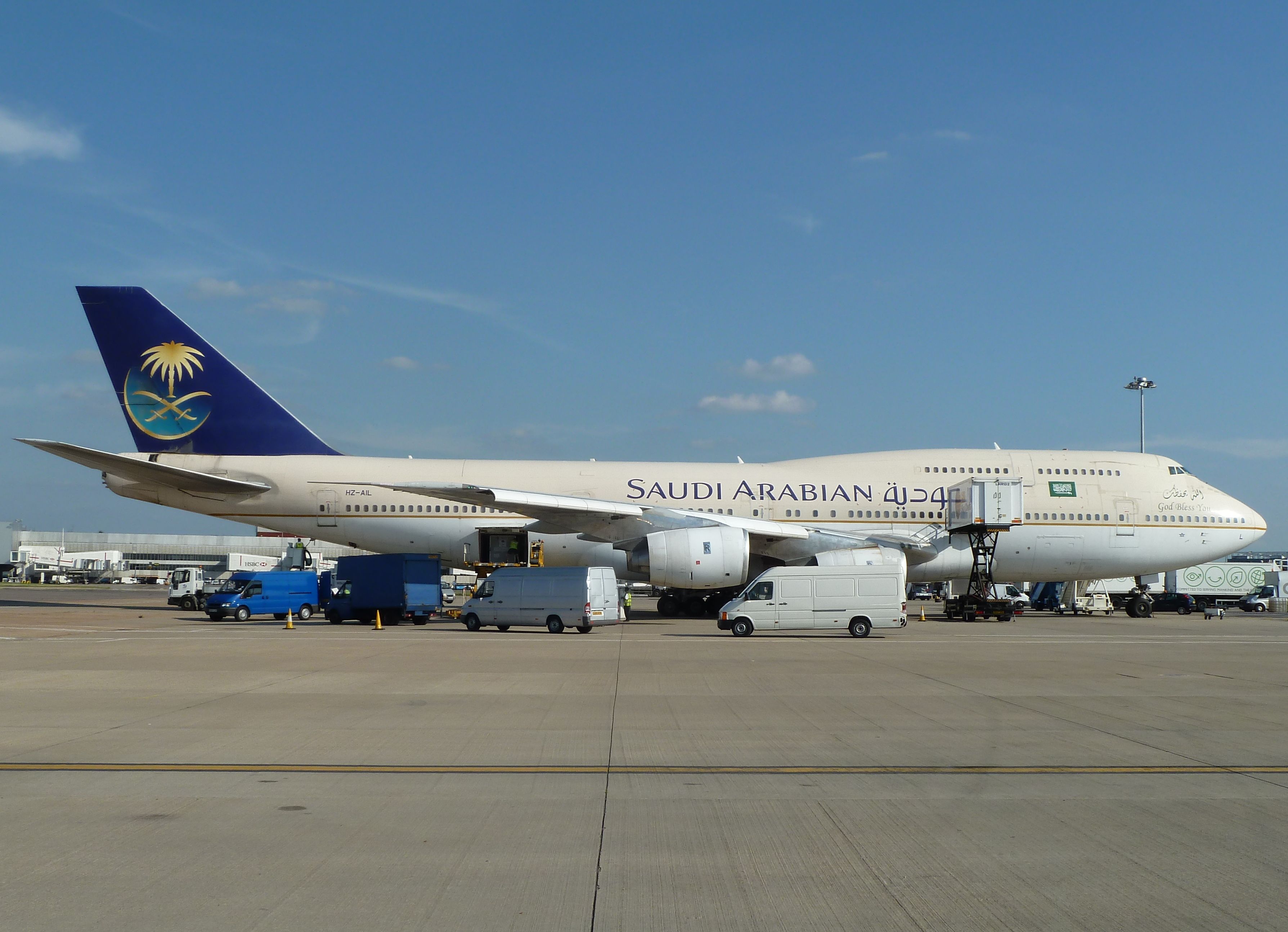 A Saudia Boeing 747-300 on an airport apron.