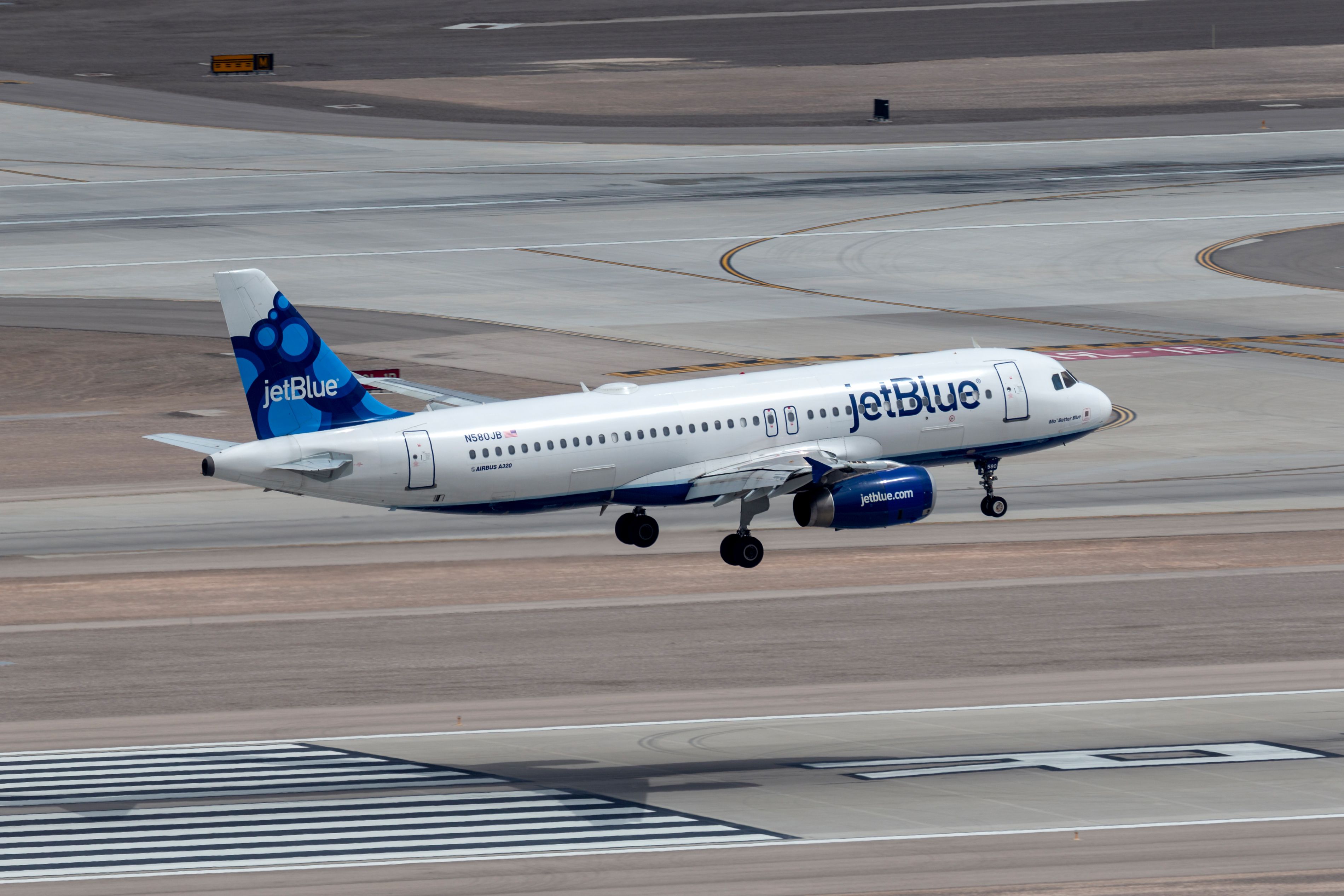A JetBlue Airbus A320 about to land.