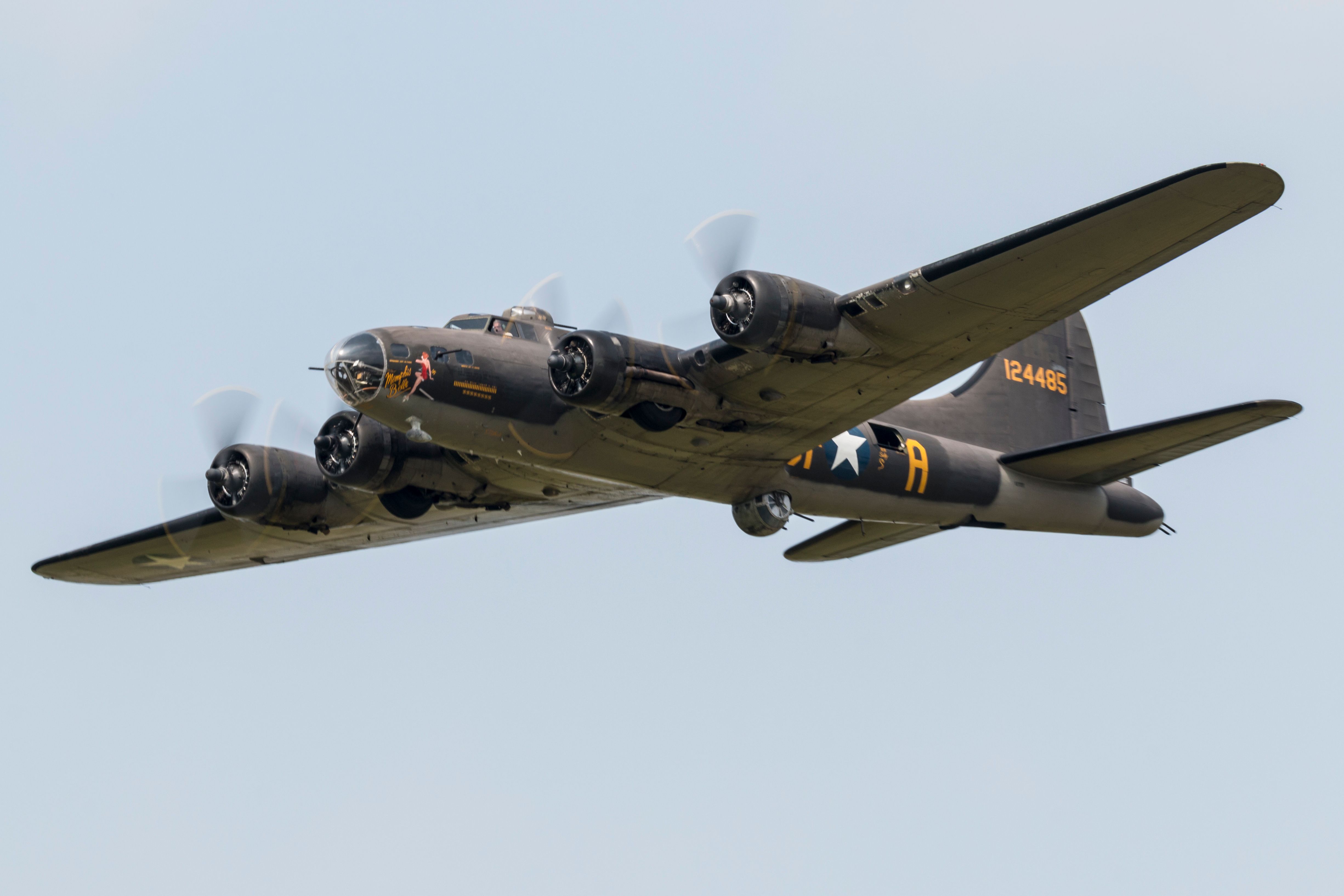 A Boeing B-17 Flying Fortress Flying in the sky.