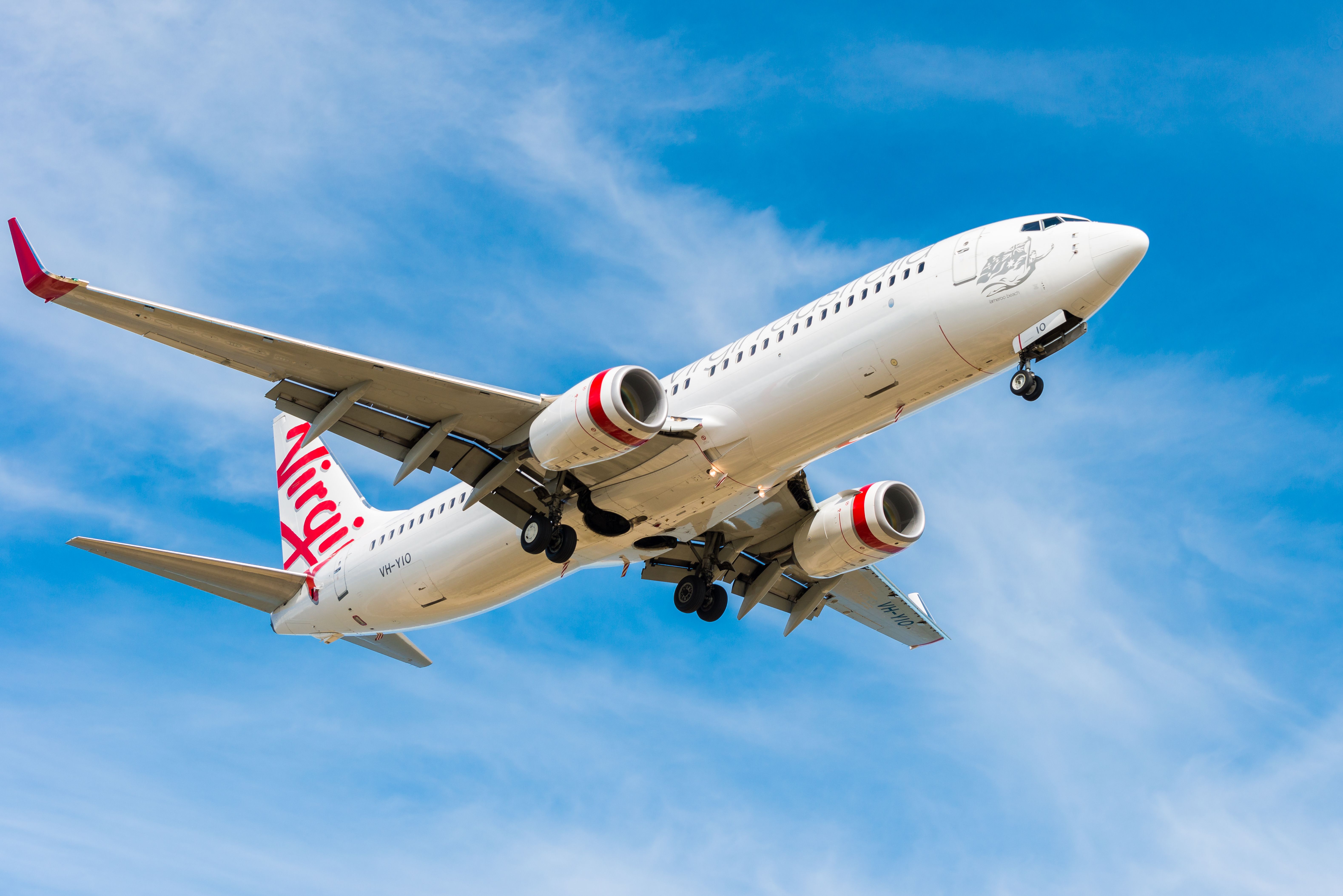 A Virgin Australia Boeing 737 flying in the sky.