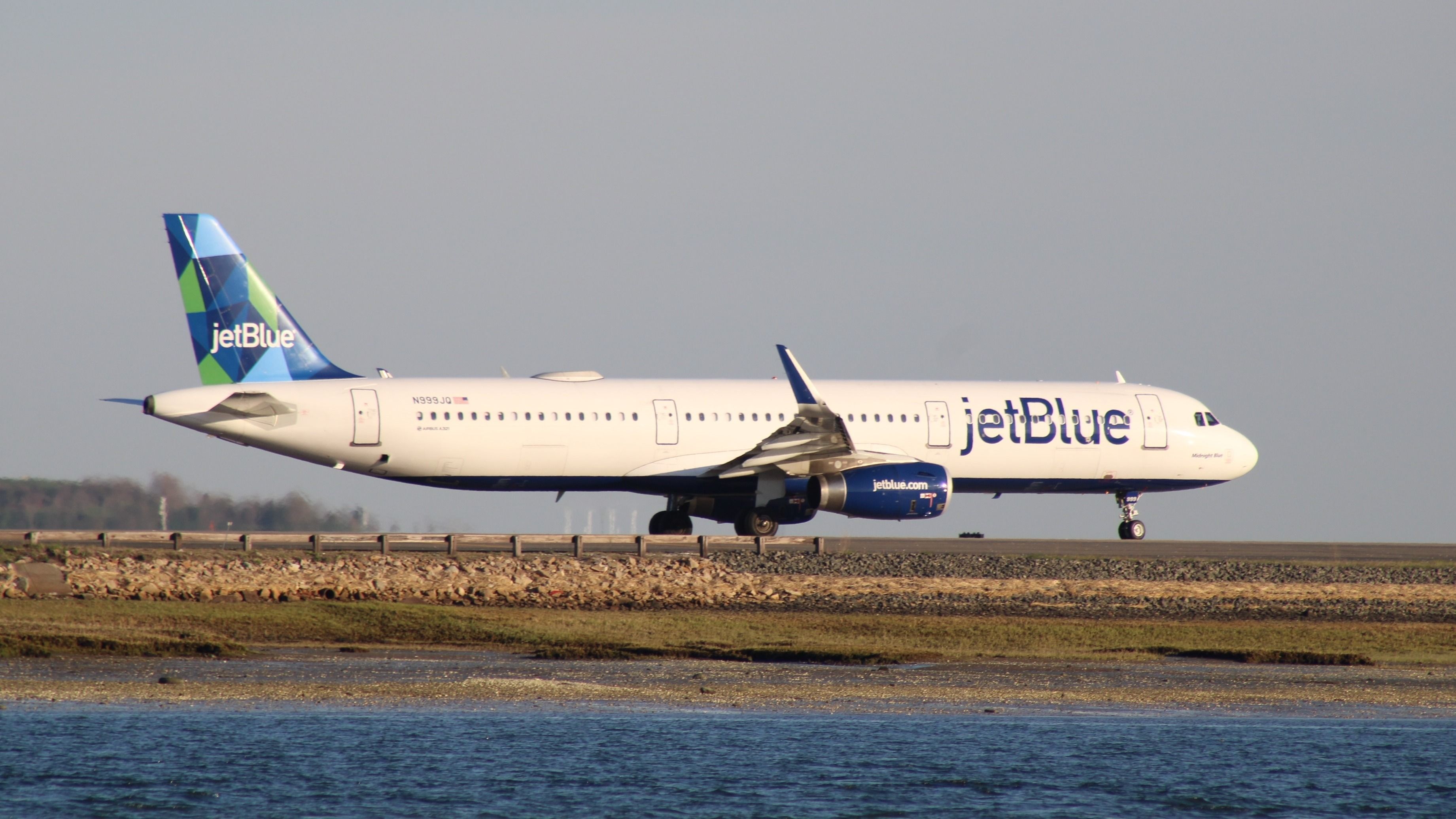 JetBlue Flight Delayed 11 Hours After Tug Vehicle Wedged Under Airbus ...