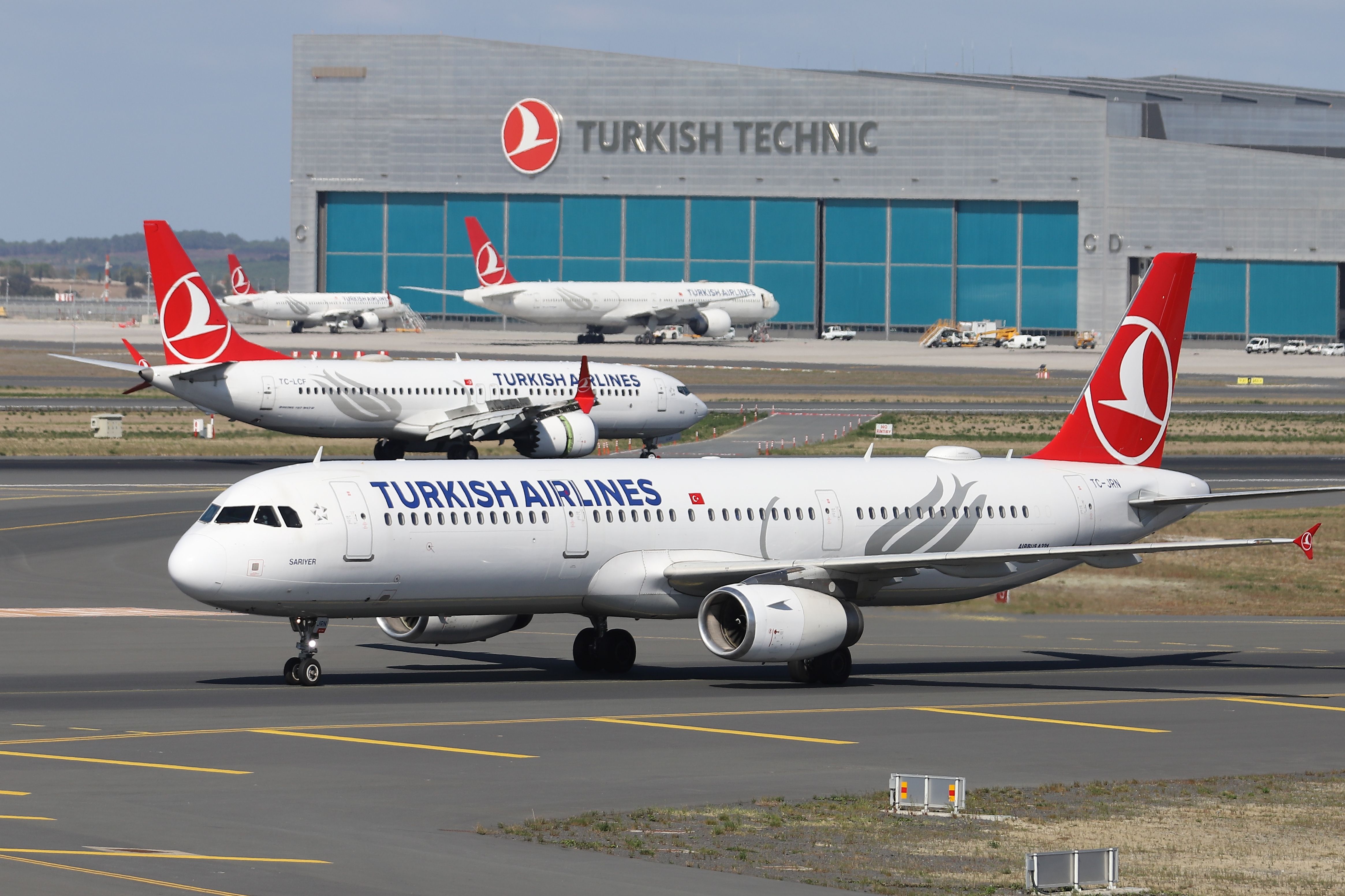 Turkish Airlines Planes Taxiing In Istanbul