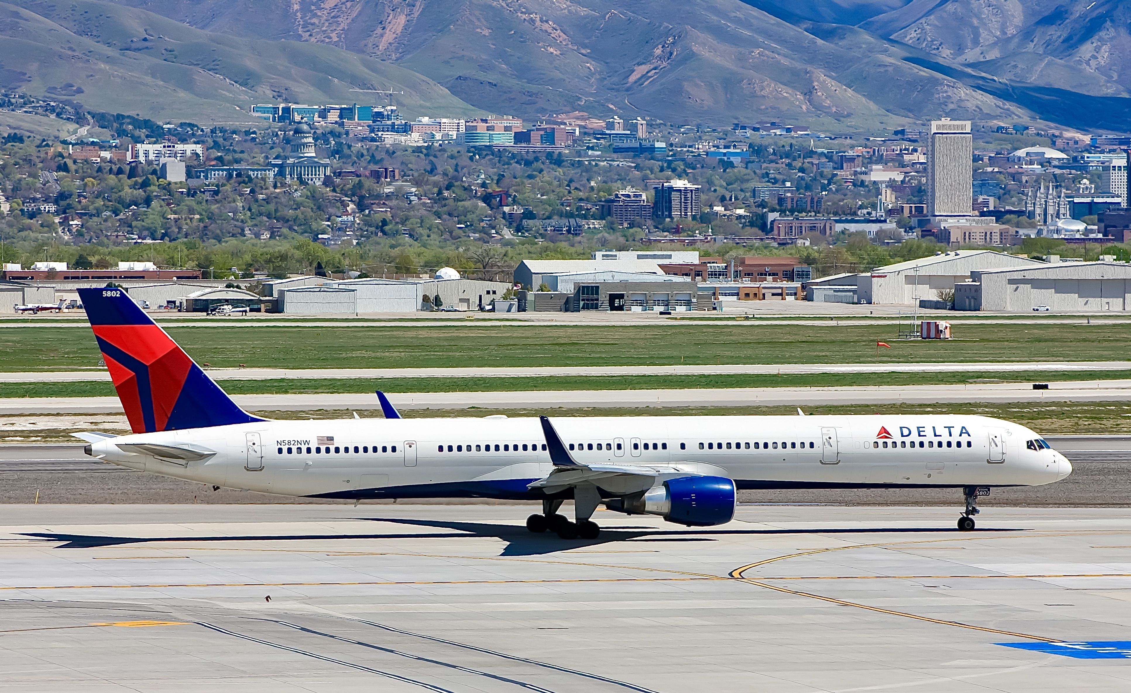 A Delta Air Lines Boeing 757-351 on the apron at Salt Lake City International Airport.