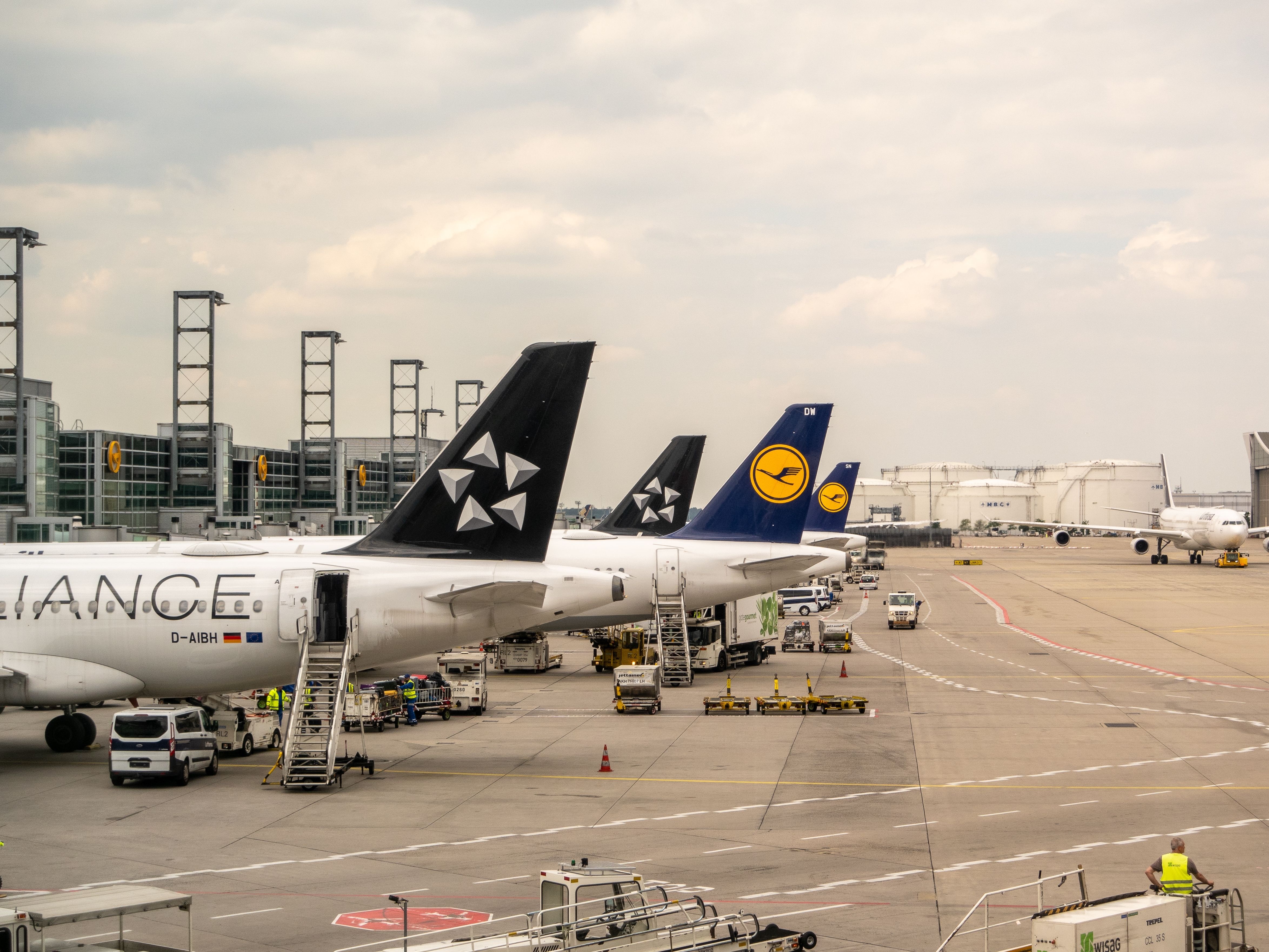 Several Lufthansa Aircraft Pakred At Gates At Frankfurt Airport.