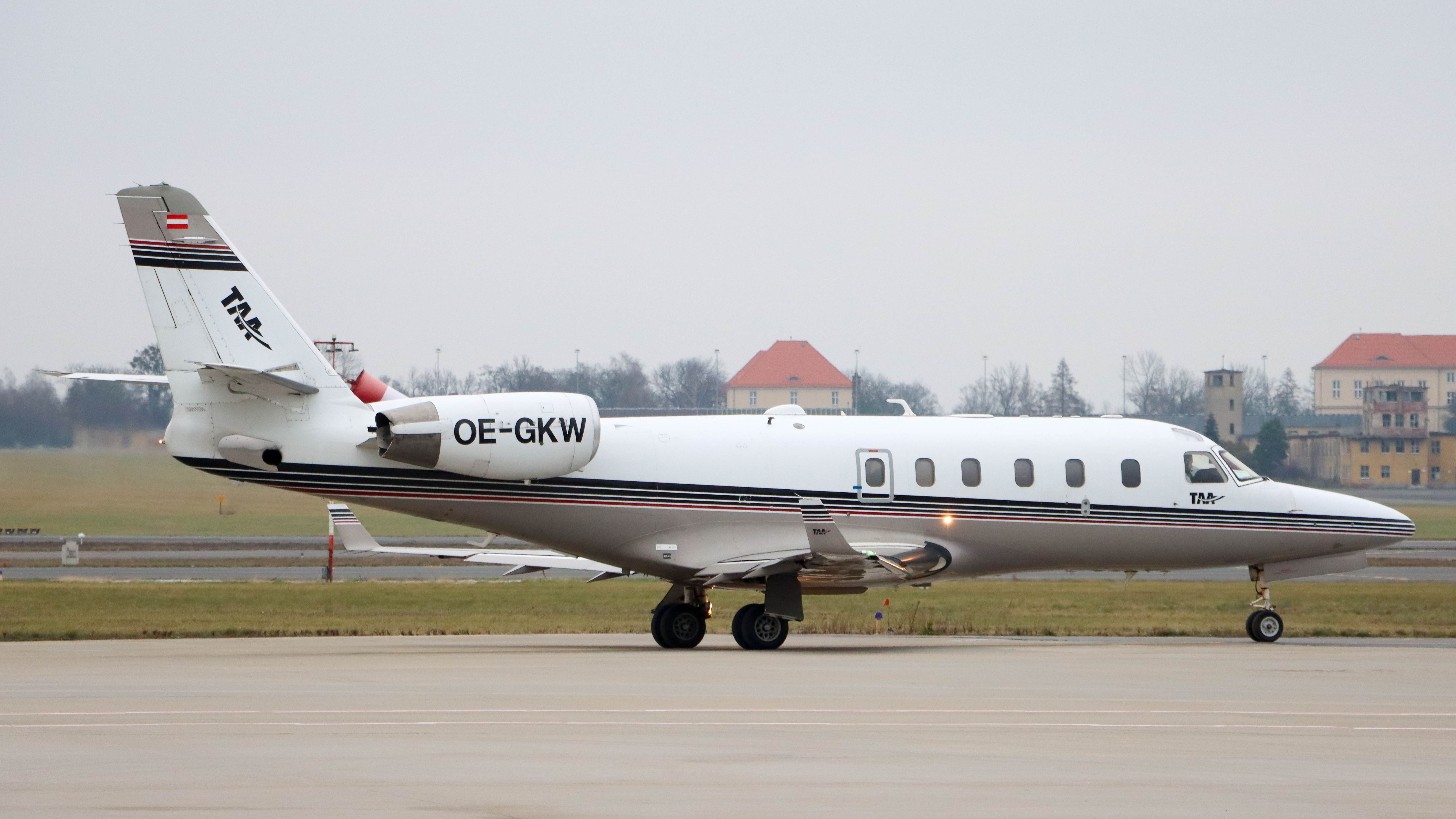 A Gulfstream G100 on an airport apron.