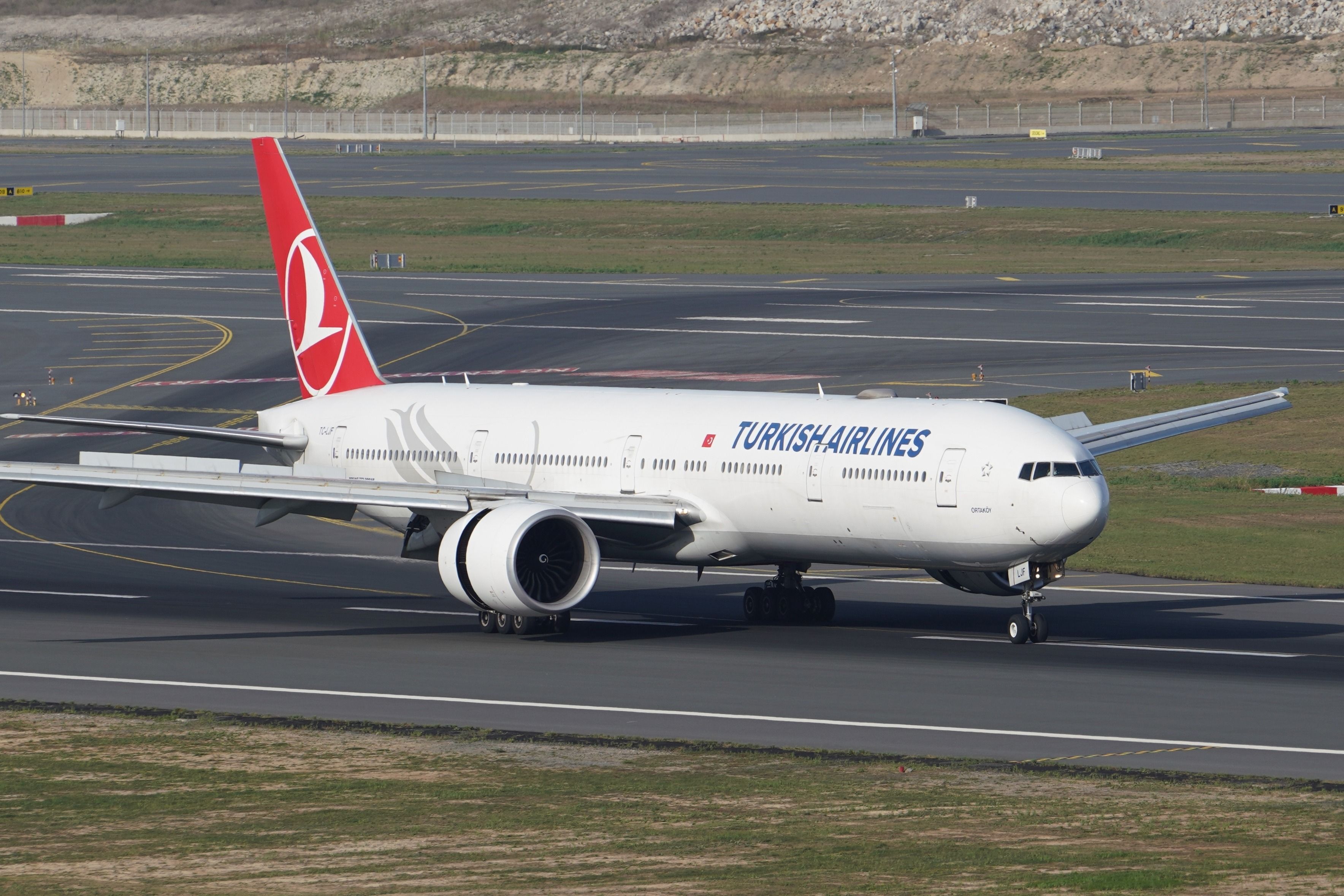 Turkish Airlines Boeing 777-3F2/ER lands at Istanbul International Airport.