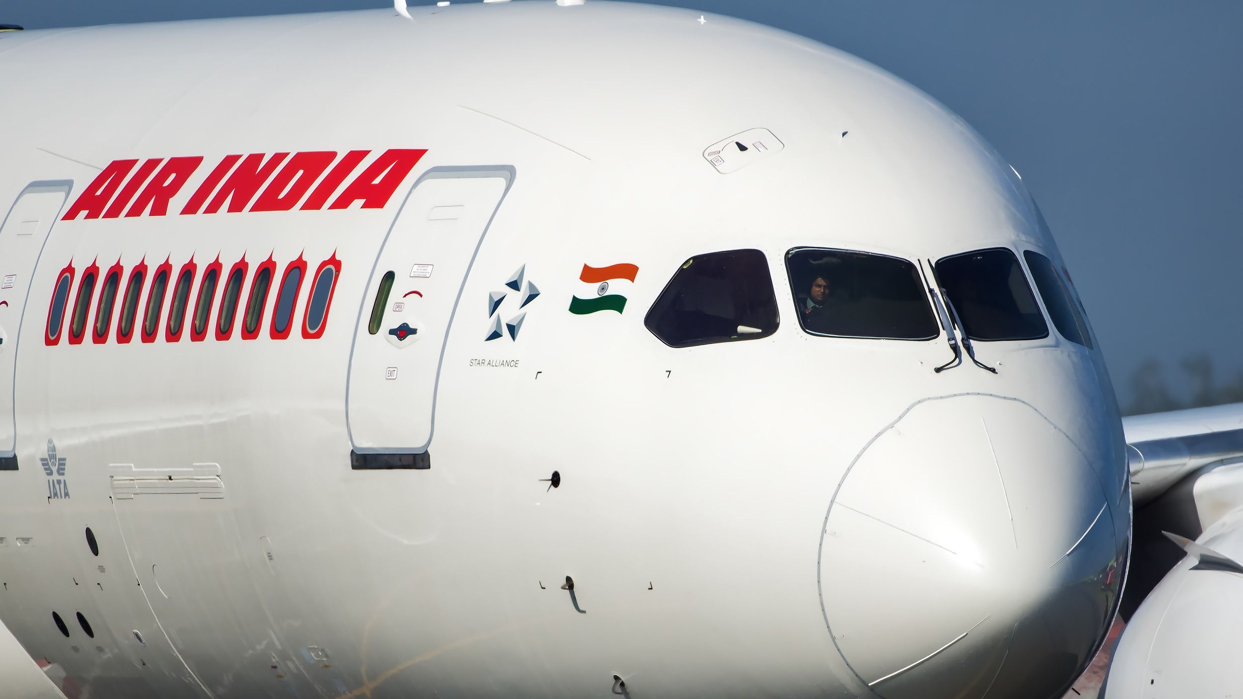 A closeup of the nose of an Air India Boeing 787.