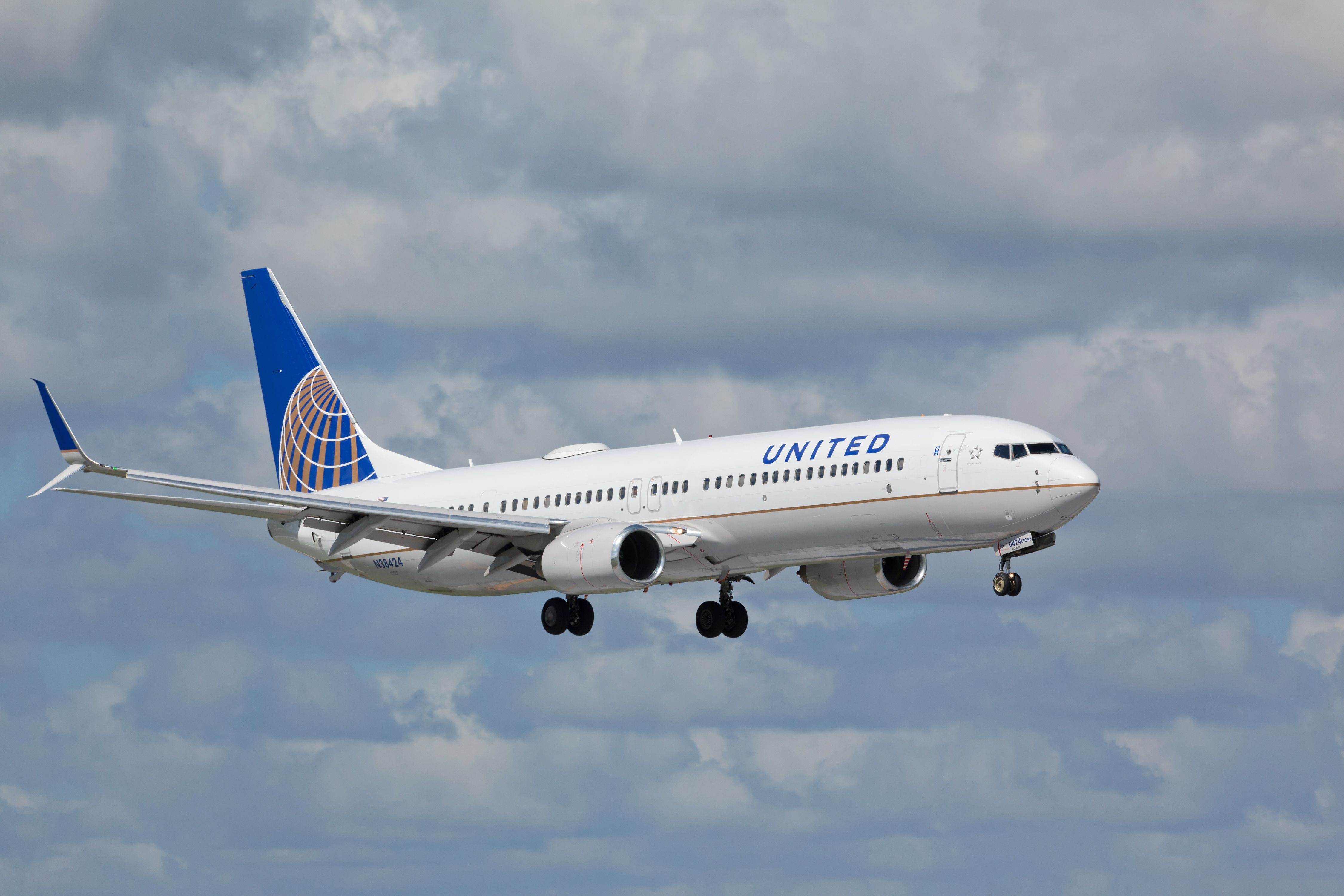 A United Airlines Boeing 737-800 Flying In The Sky.