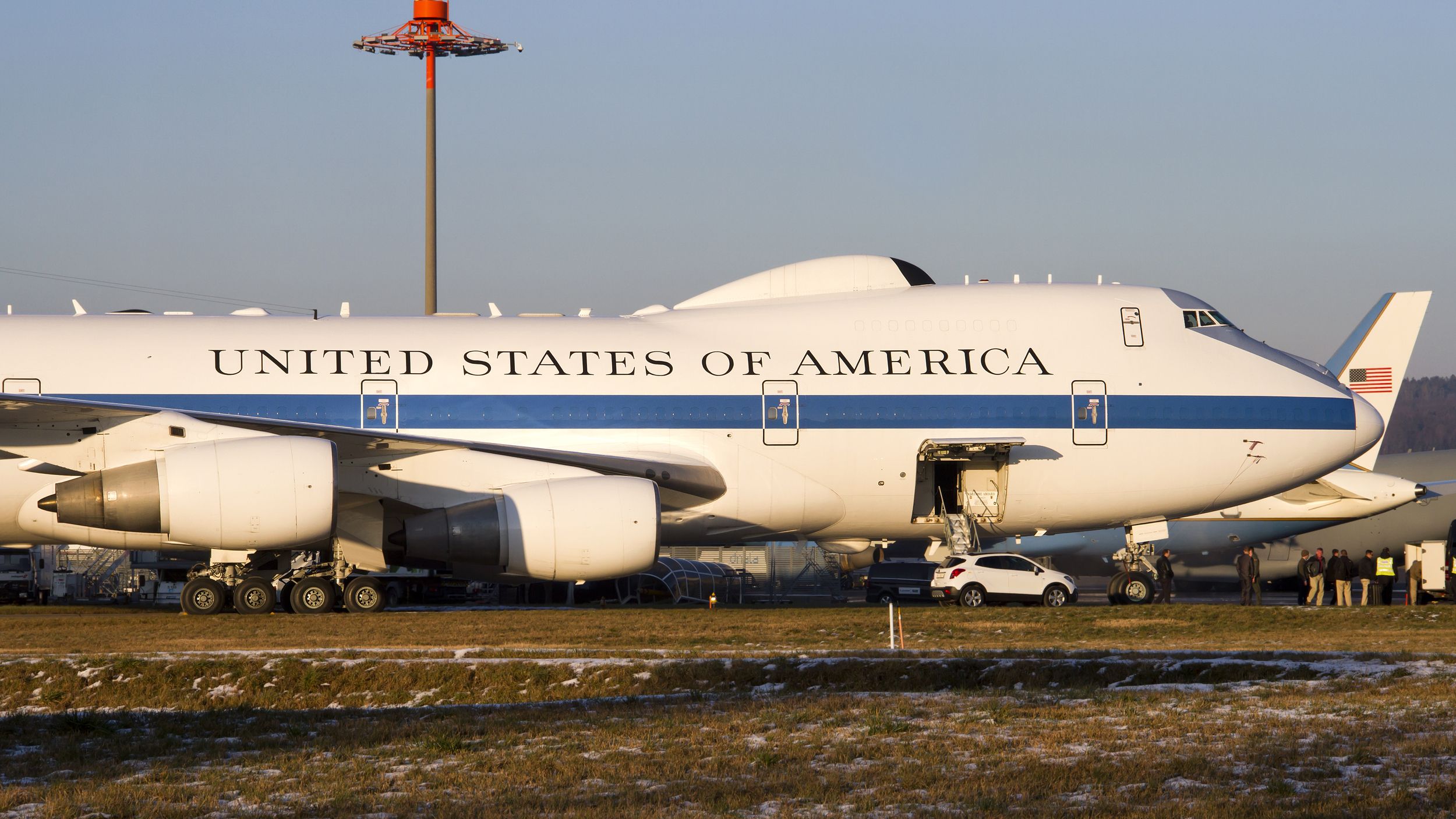 A US Government Boeing 747-200 parked at an airfield.