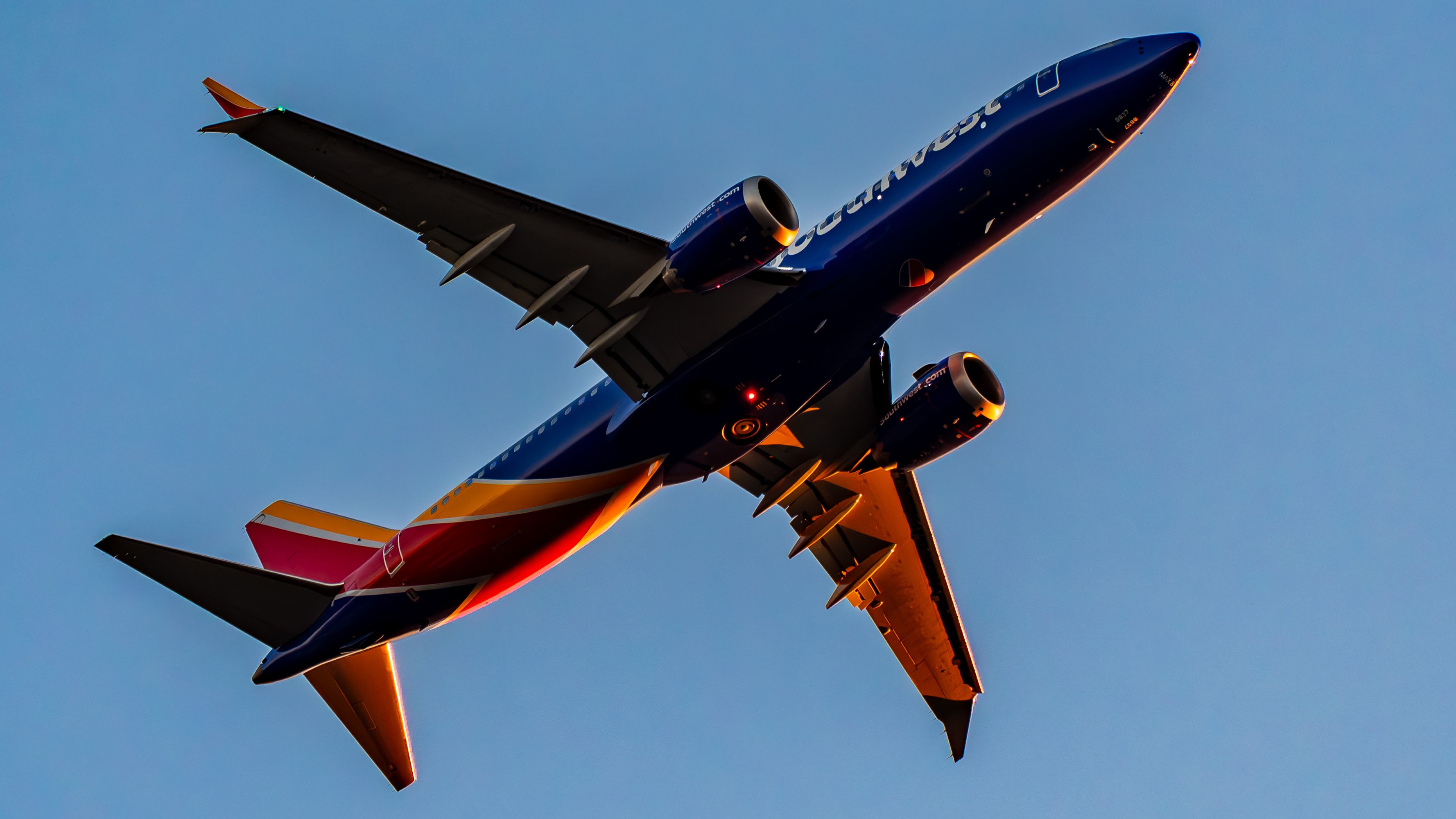 Looking Up at Southwest Airlines 737 MAX 8 With Beacon at SEA Sunset - 16x9