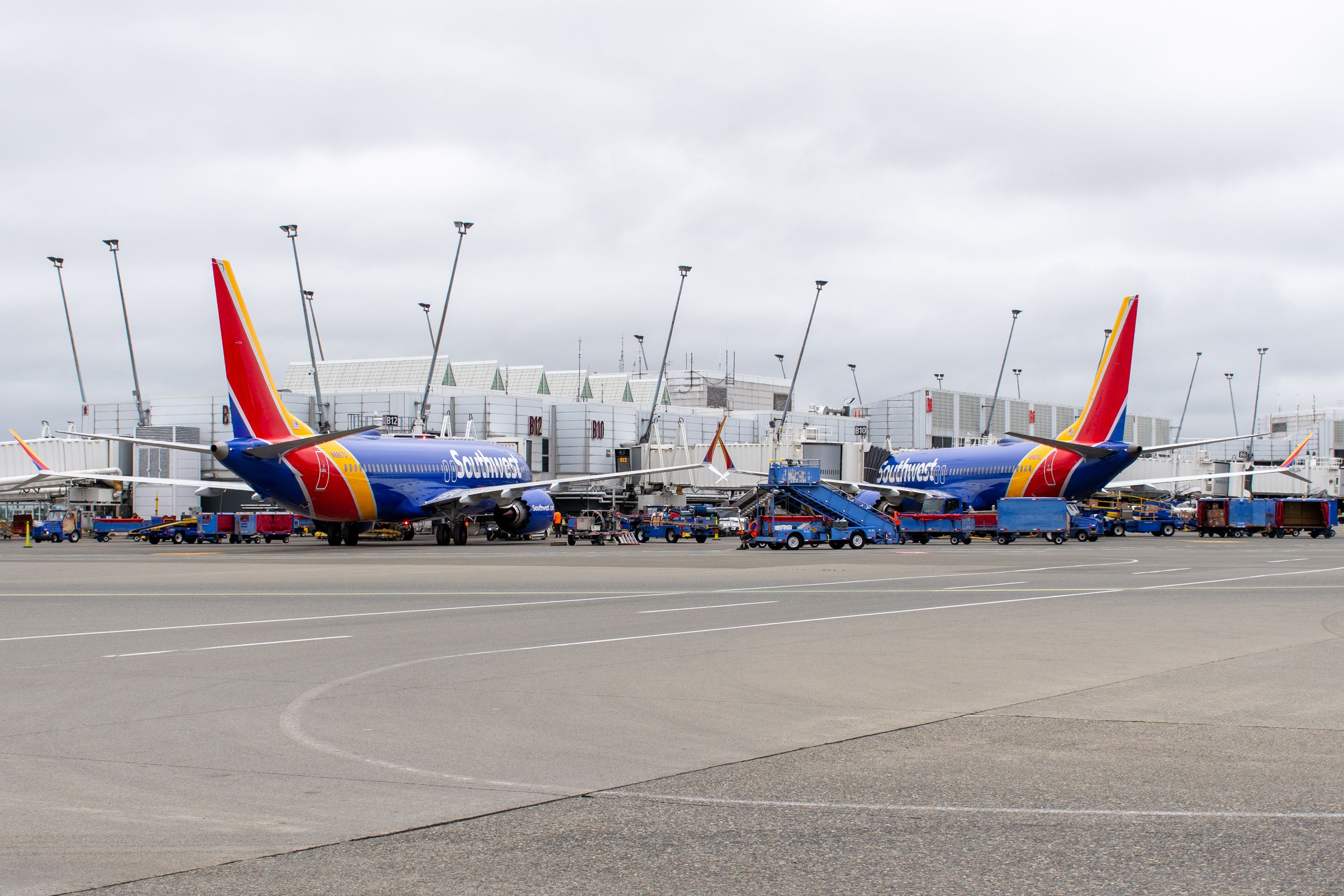 Two Southwest Airlines Boeing 737 MAX 8 aircraft parked at Seattle-Tacoma International Airport.