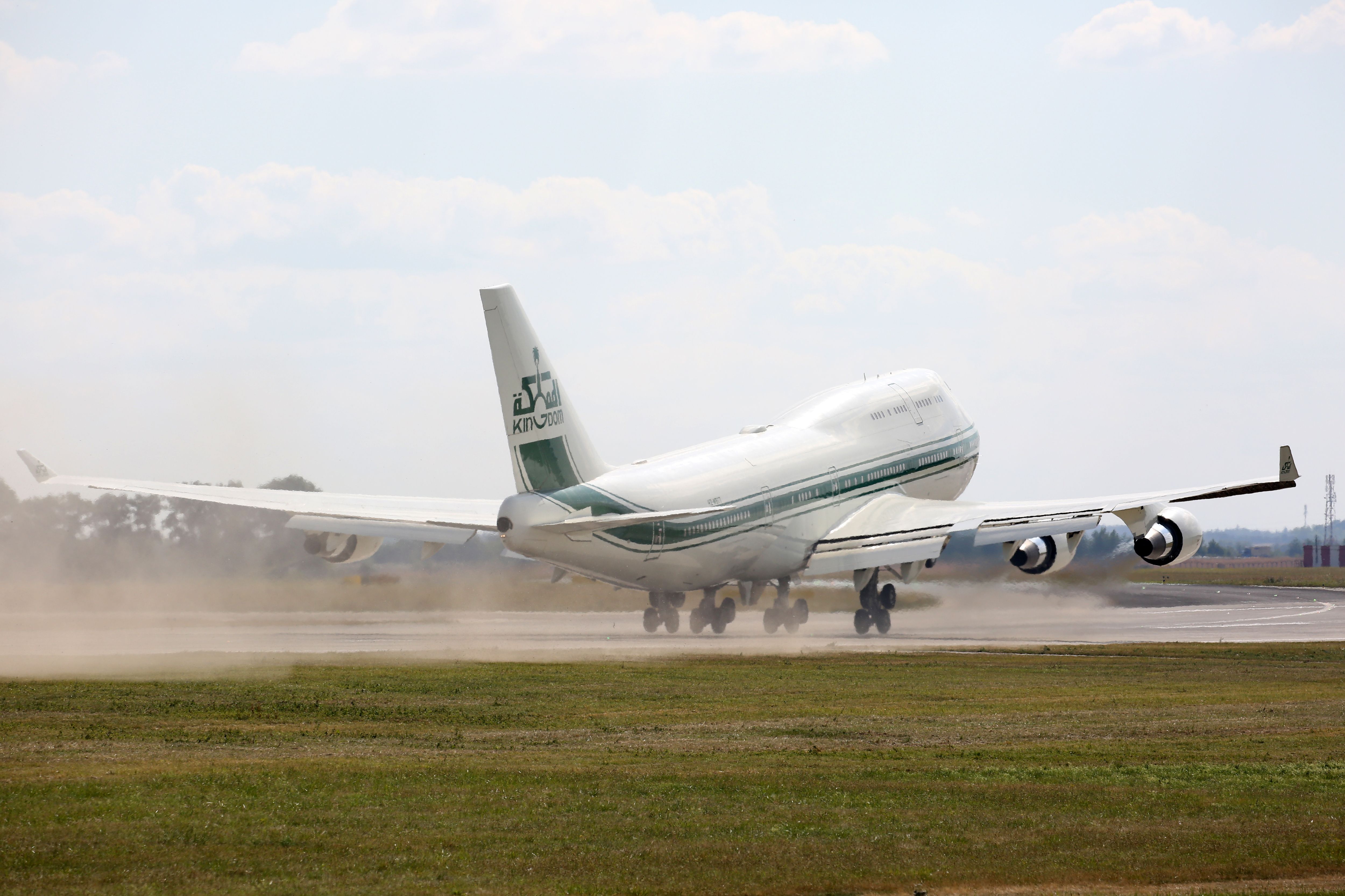 Prince Talal's Boeing 747 departing from a runway.