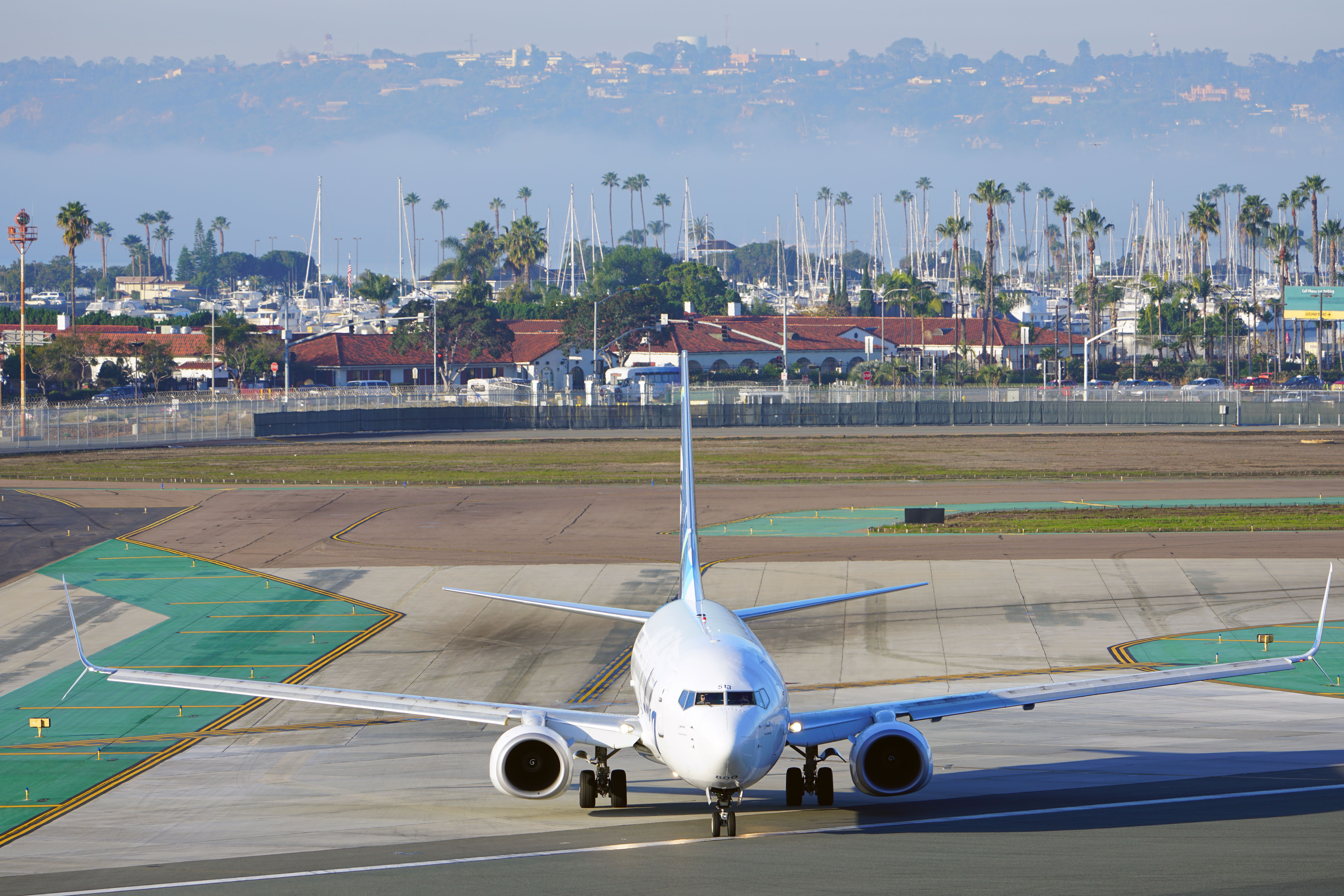 View of a Boeing 737-800 from Alaska Airlines getting reaty for takeoff the San Diego International Airport 