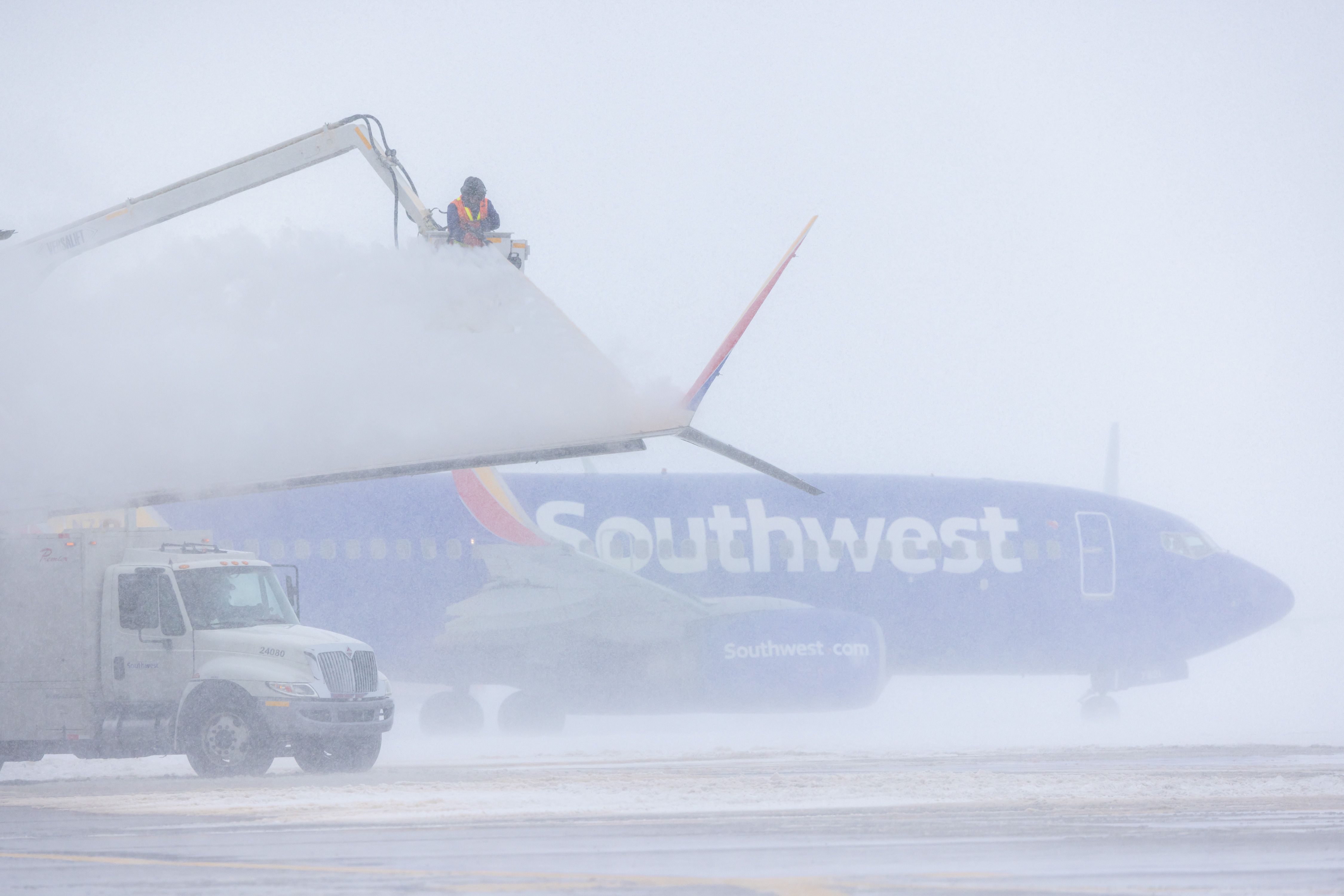 Southwest 737 at a snowy Denver International Airport.