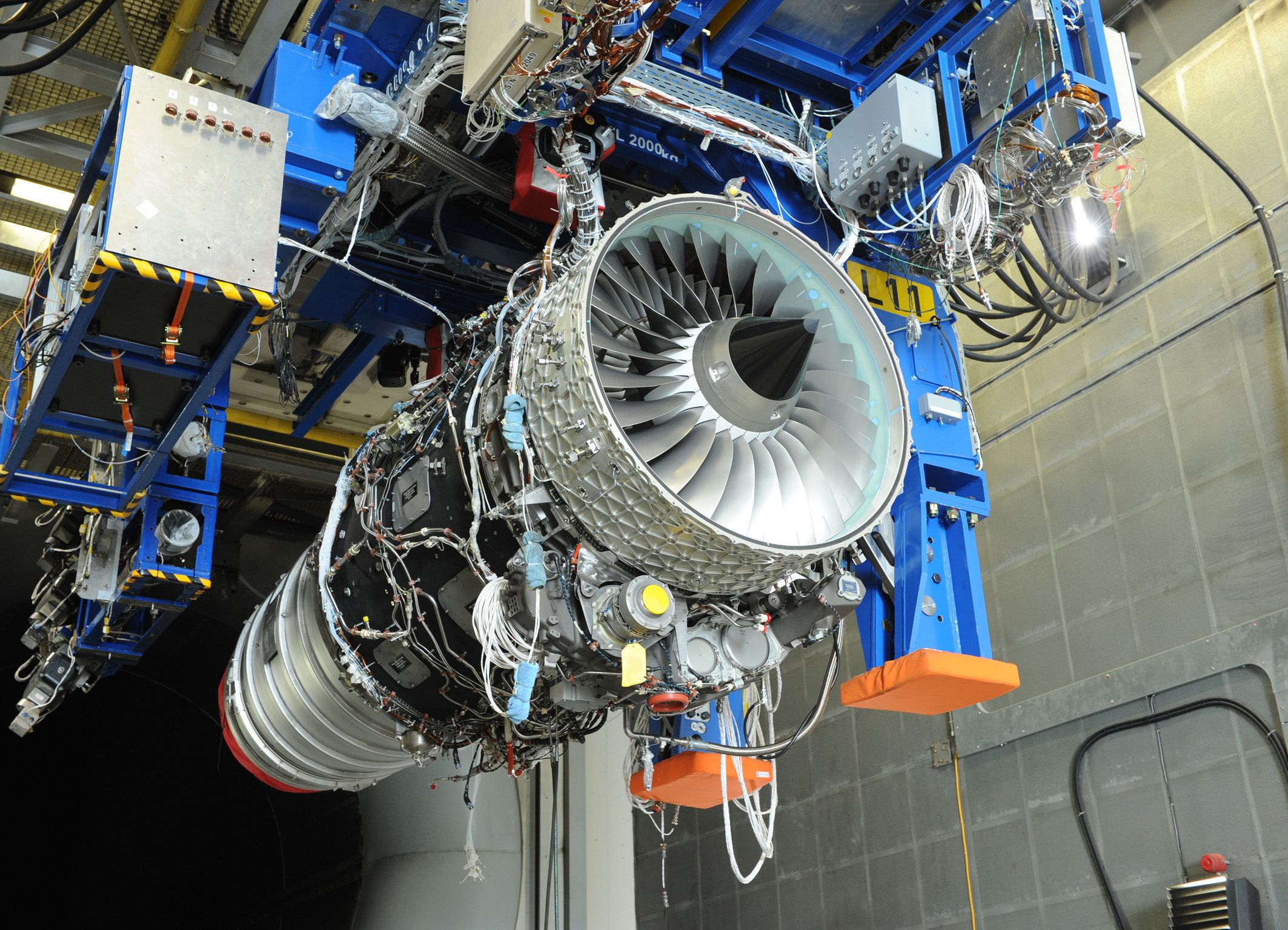 A Rolls Royce Pearl 15 engine on a test stand.