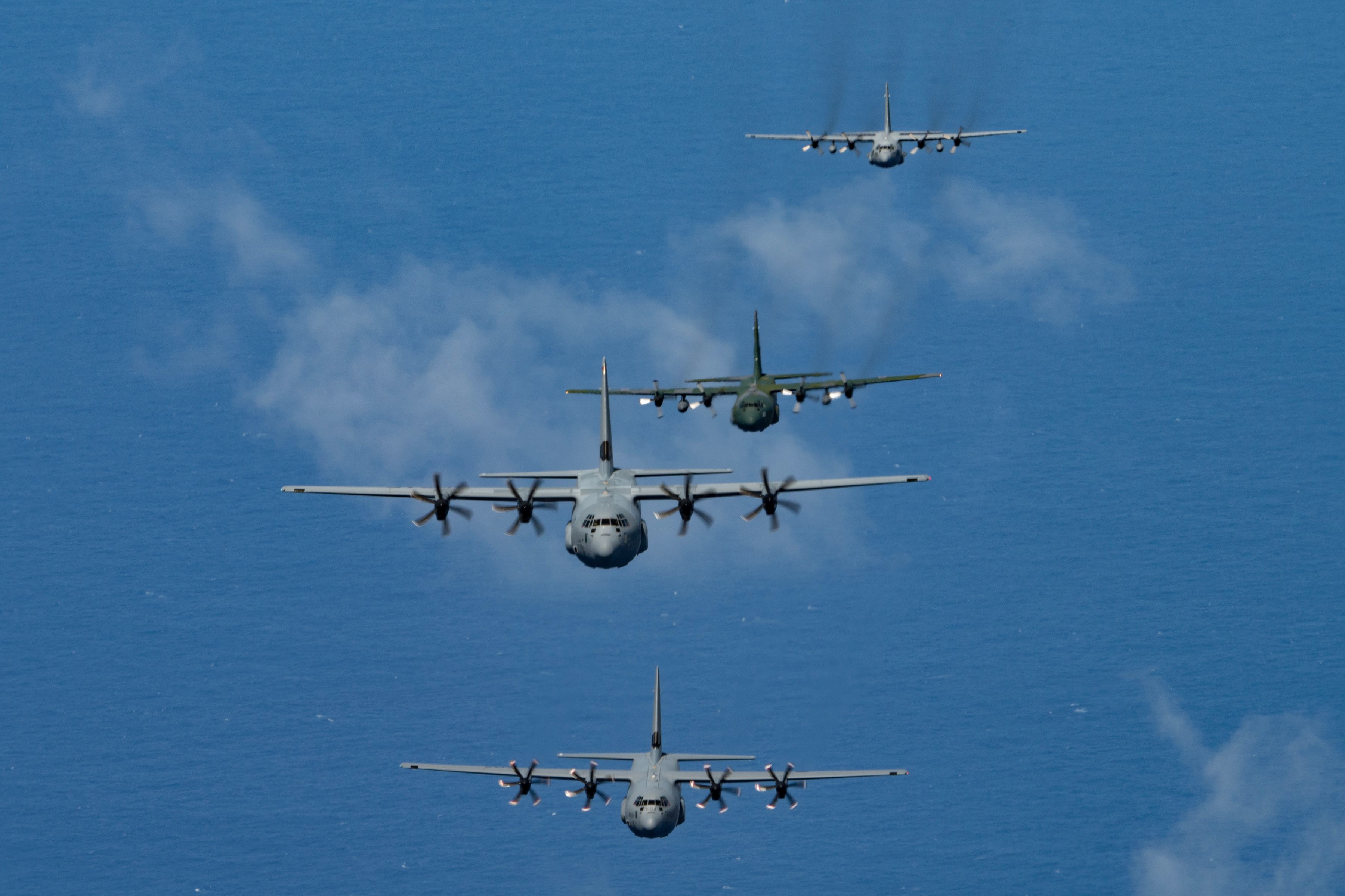 8160637 - Santa 73: OCD23 wrap up with a multinational formation flight [Image 11 of 13] - Head On With Four C-130 Hercules